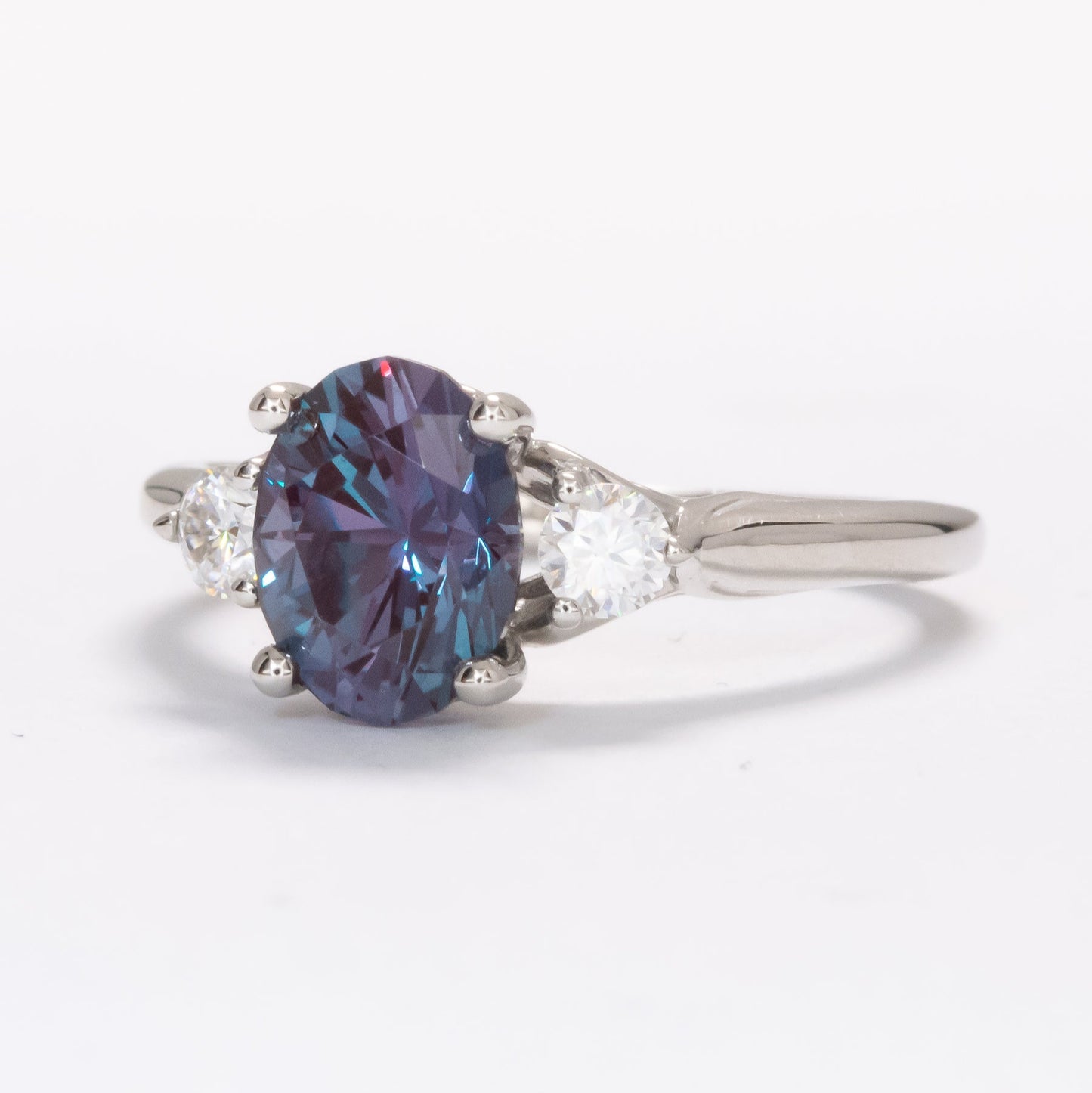 robin three stone engagement ring with oval lab alexandrite