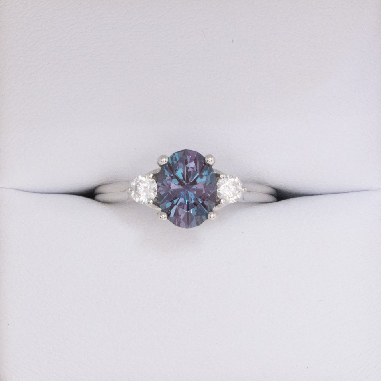 robin three stone engagement ring with oval lab alexandrite