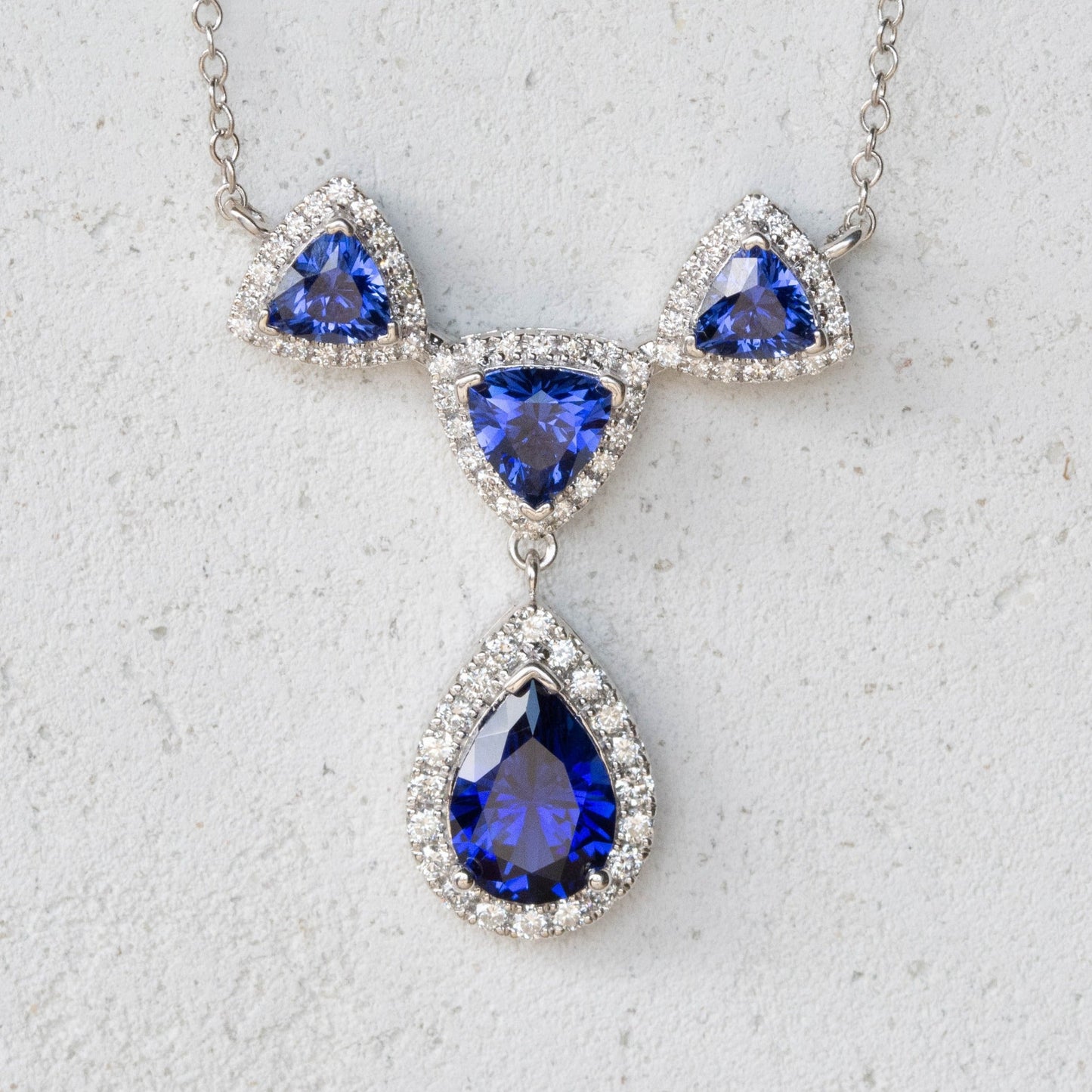 royal blue lab sapphire necklace with halos
