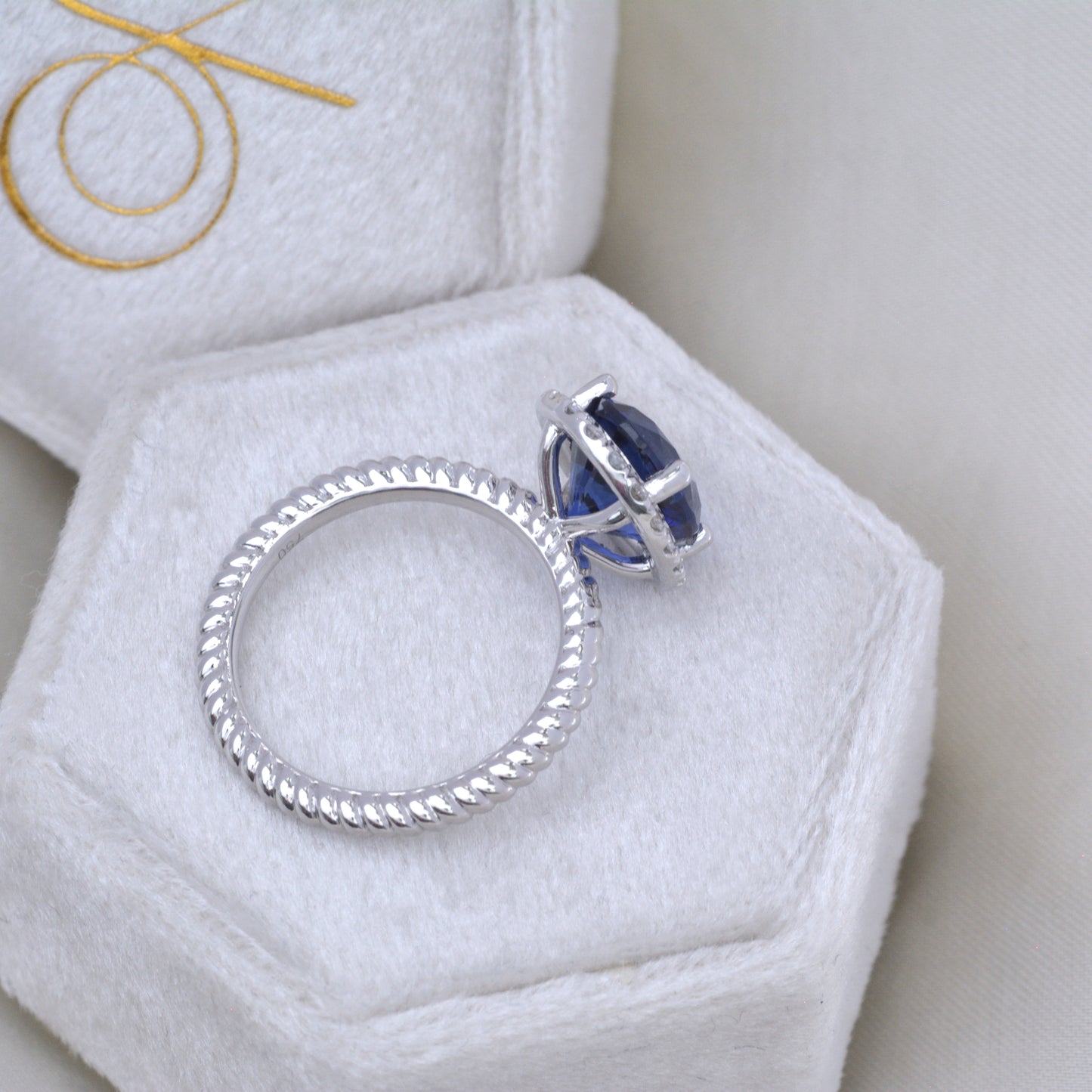 royal blue oval lab sapphire halo engagement ring
