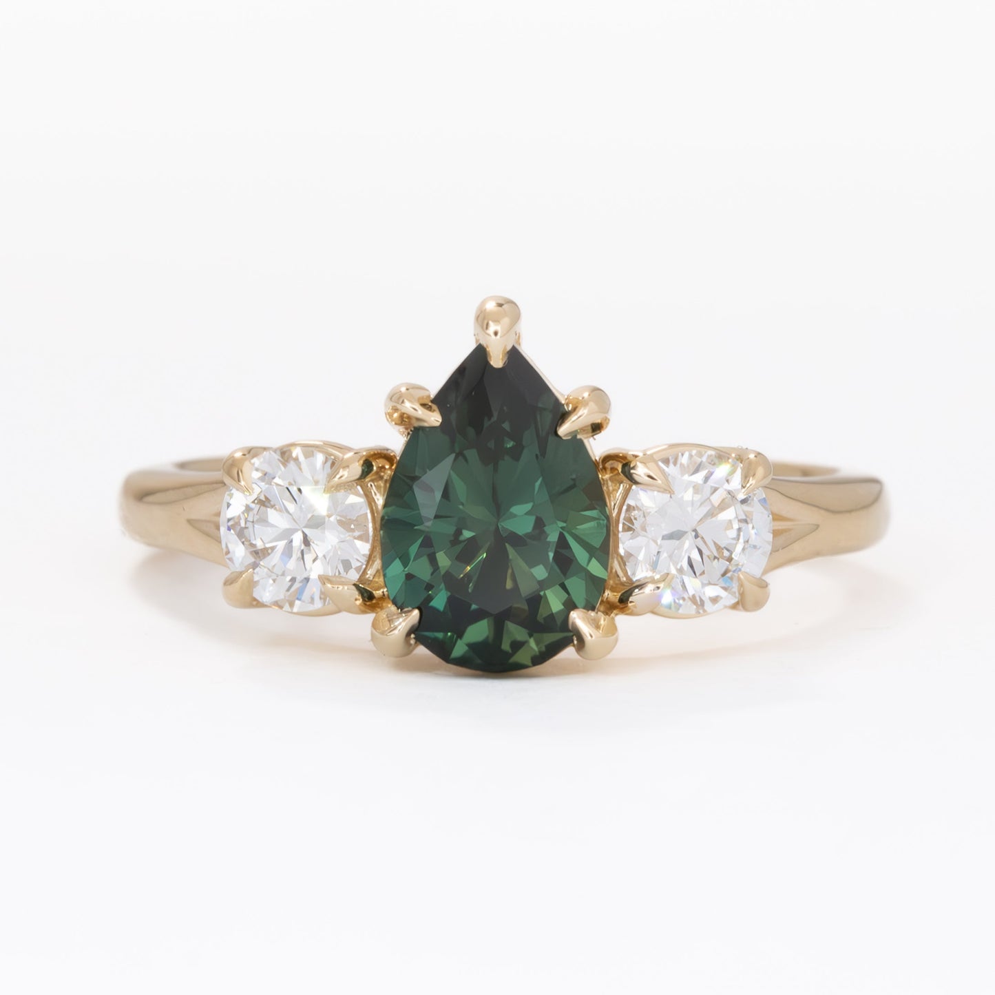 rylee three stone engagement ring with pear green lab sapphire