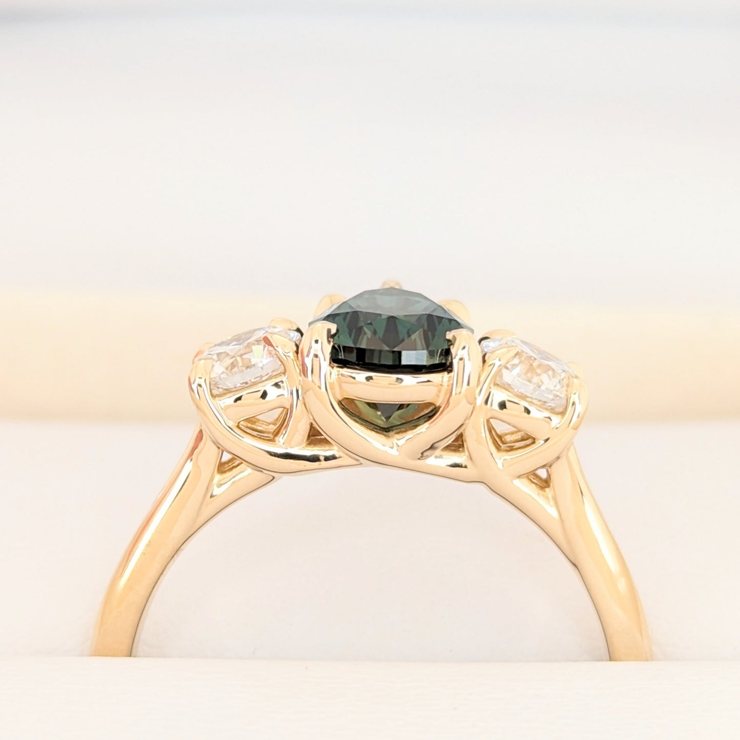 rylee three stone engagement ring with pear green lab sapphire