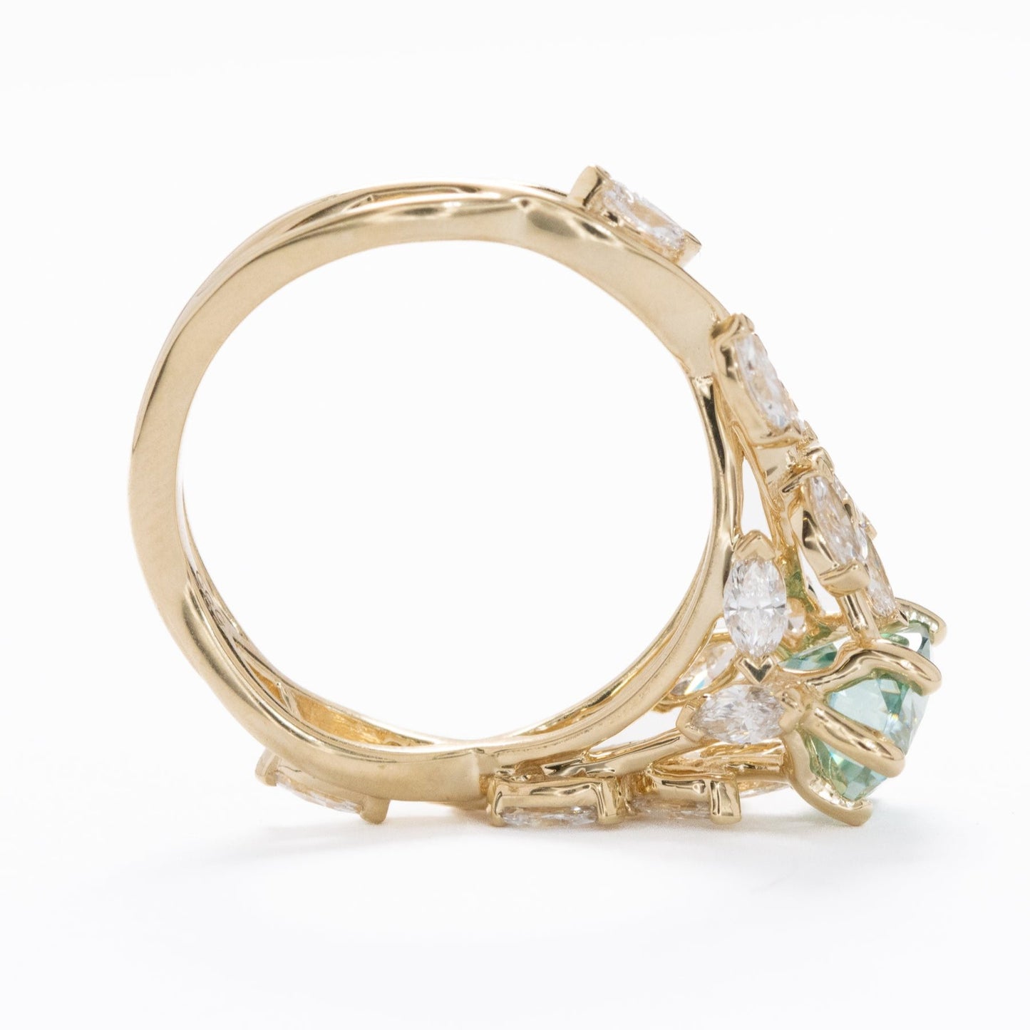 senna nature inspired engagement ring with oval blue-green moissanite