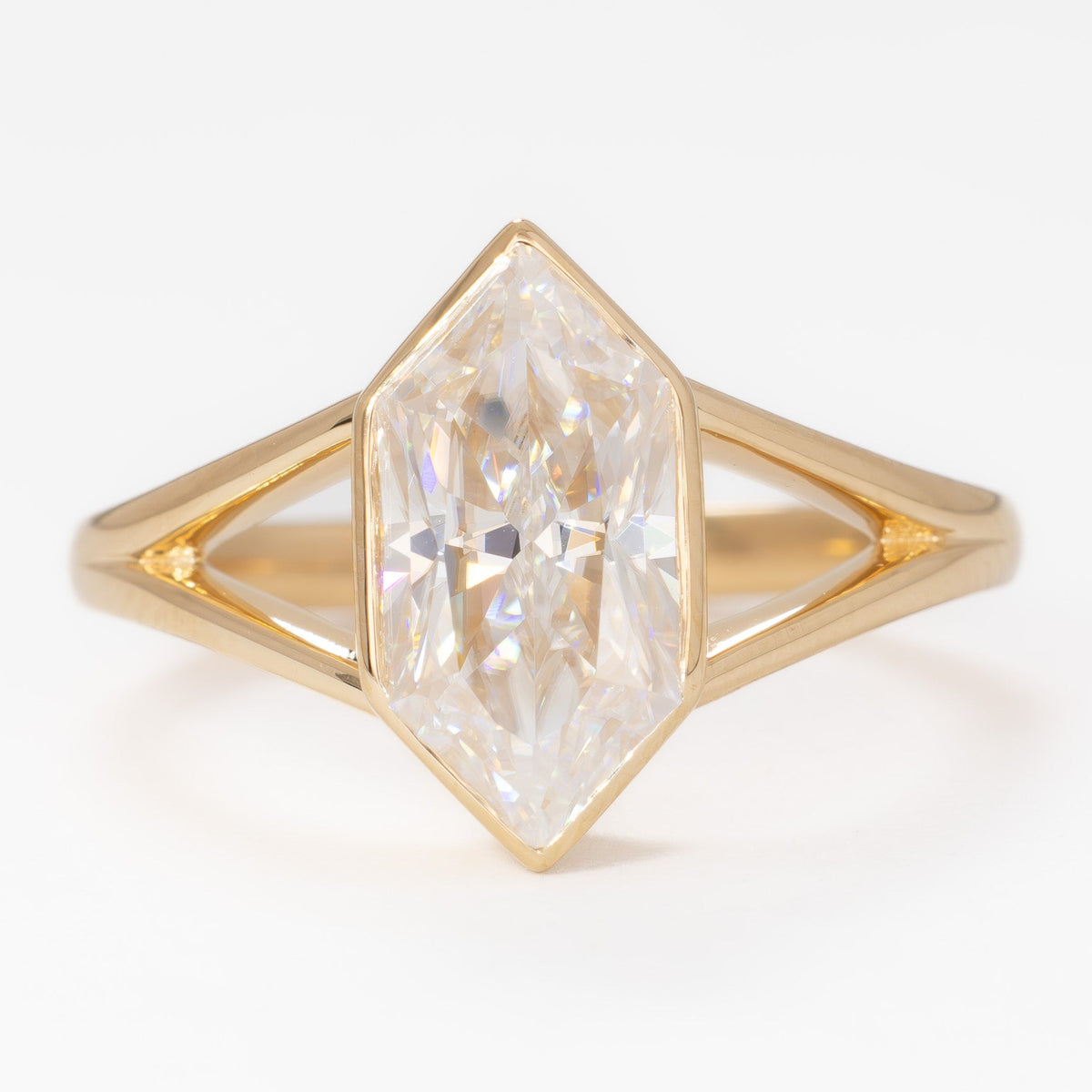 shion solitaire split shank ring in yellow gold with dutch marquise moissanite