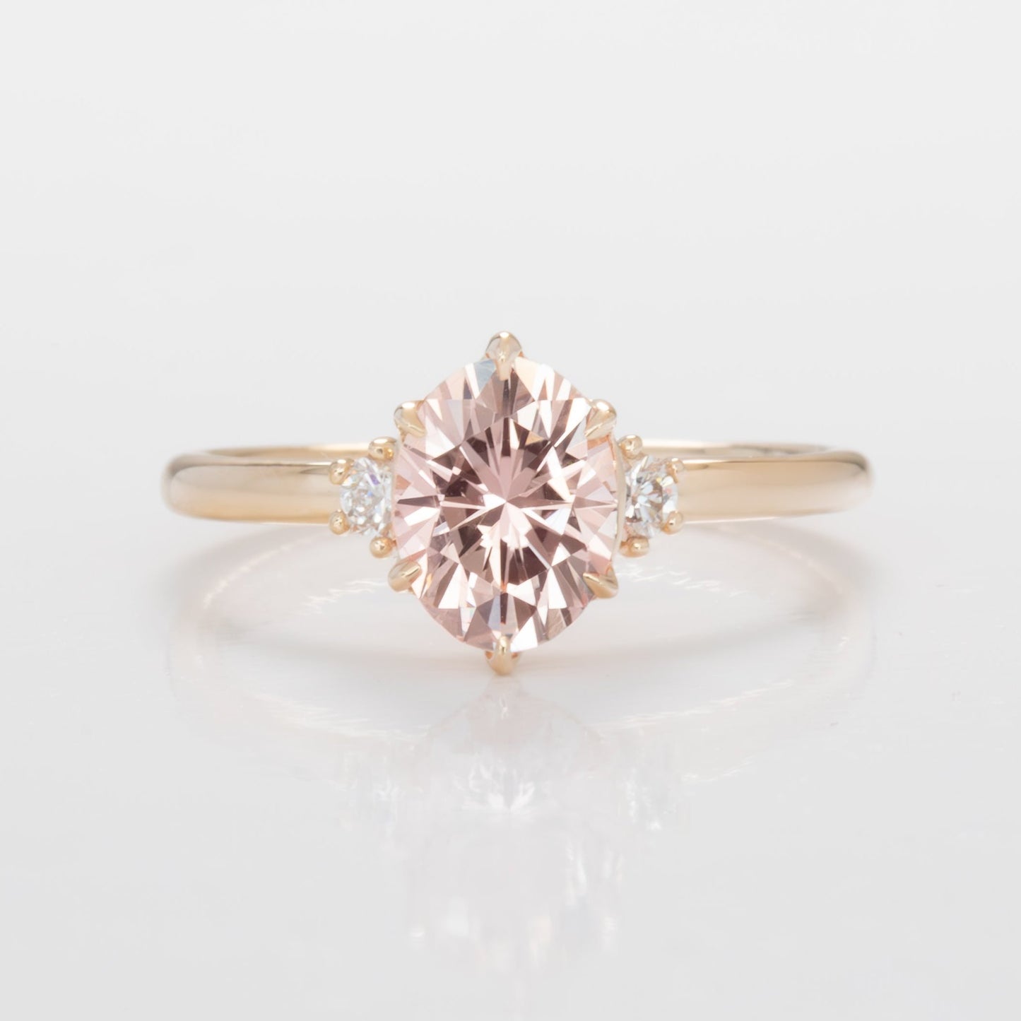 signy engagementring with oval peach lab sapphire
