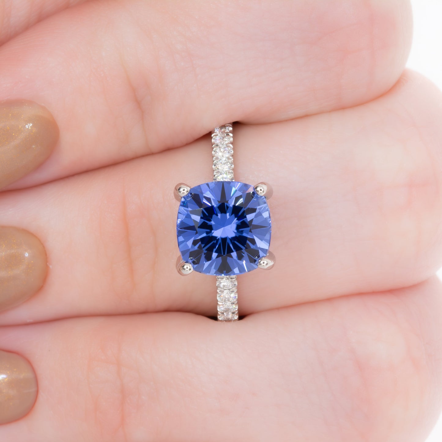 sofia engagement ring with blue cushion lab sapphire