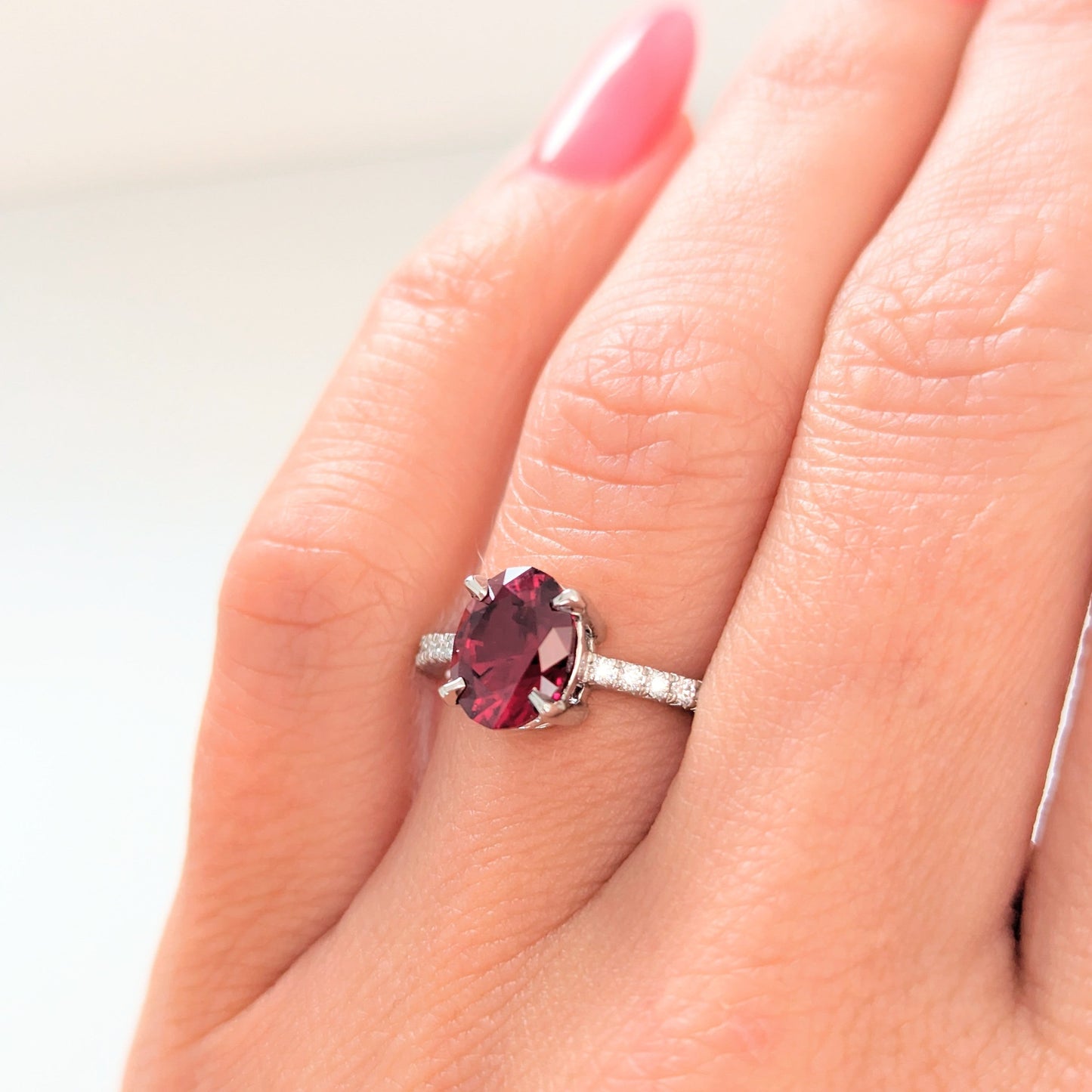 sofia engagement ring with oval lab ruby