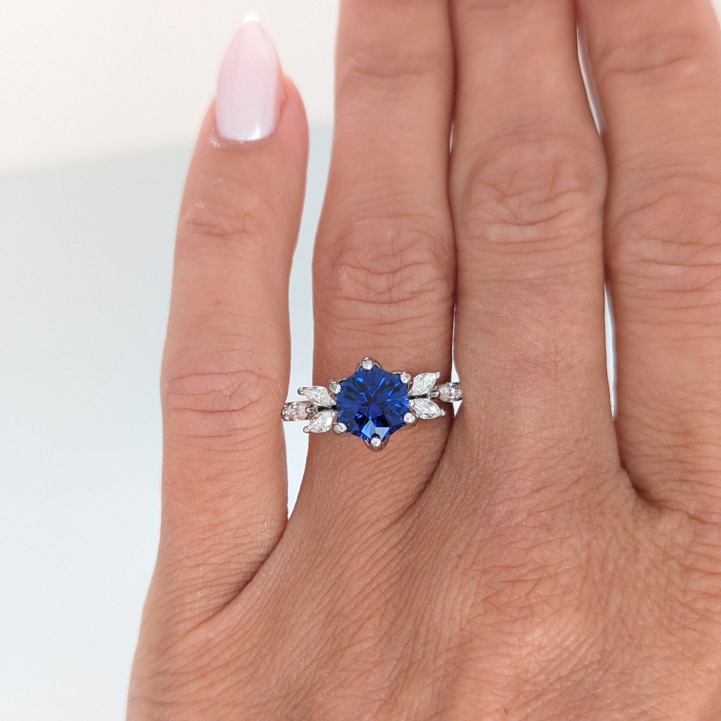 talia engagement rign with royal blue lab sapphire