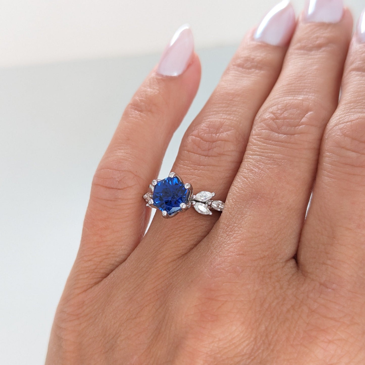 talia engagement rign with royal blue lab sapphire