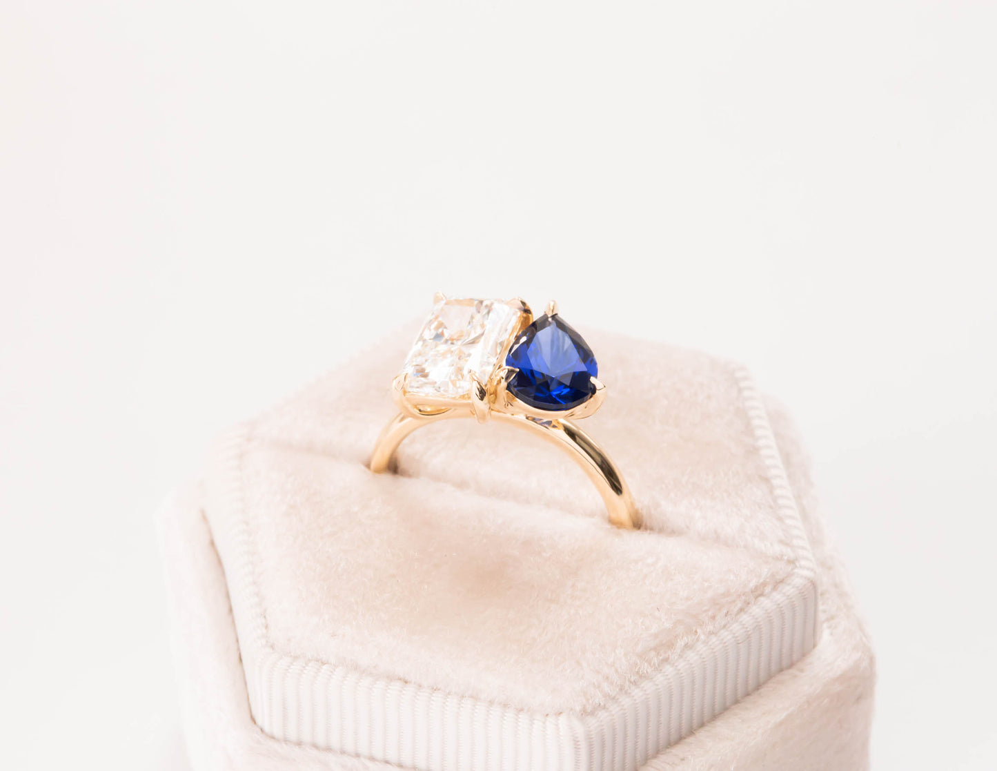 toi et moi ring with lab diamond and royal blue lab sapphire