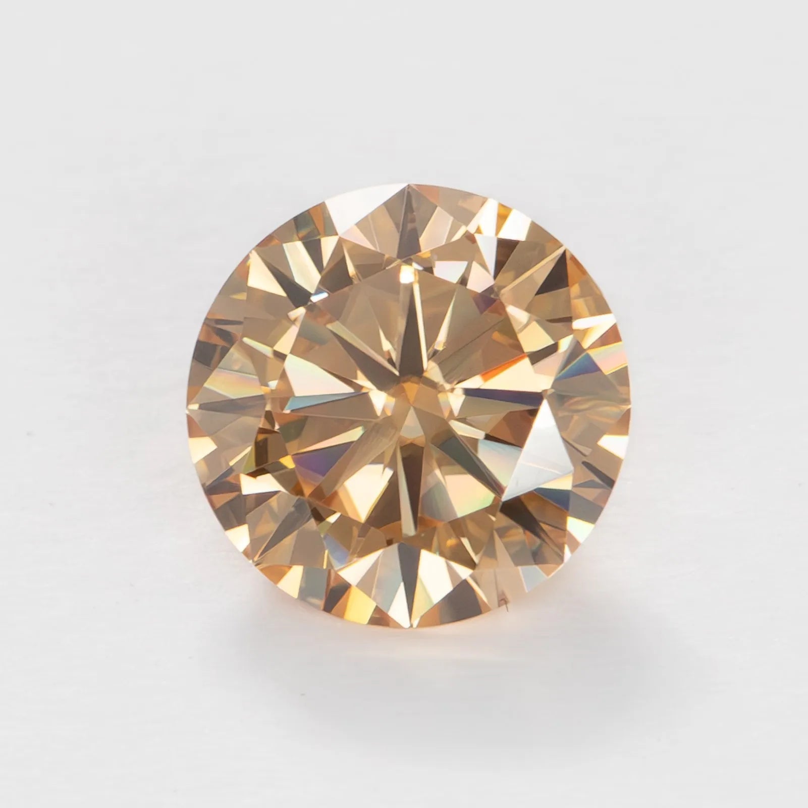 golden moissanite round brilliant
