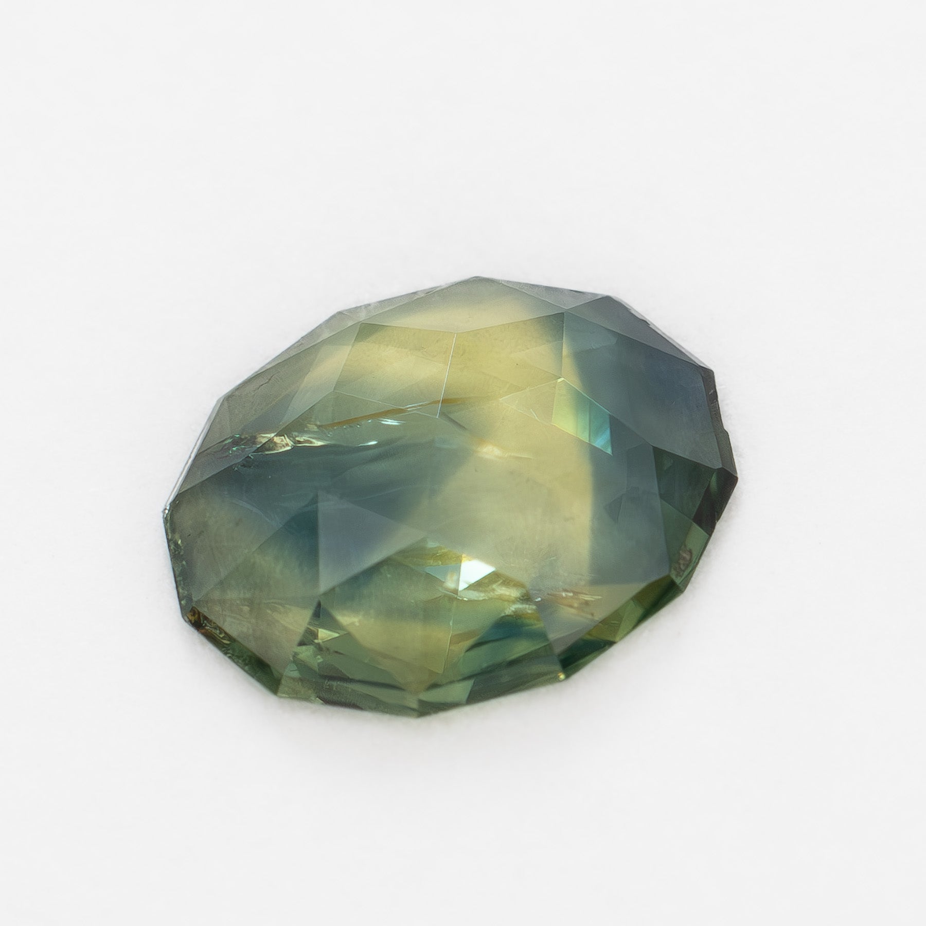 AU0120 0.64ct oval rose cut blue and yellow australian sapphire