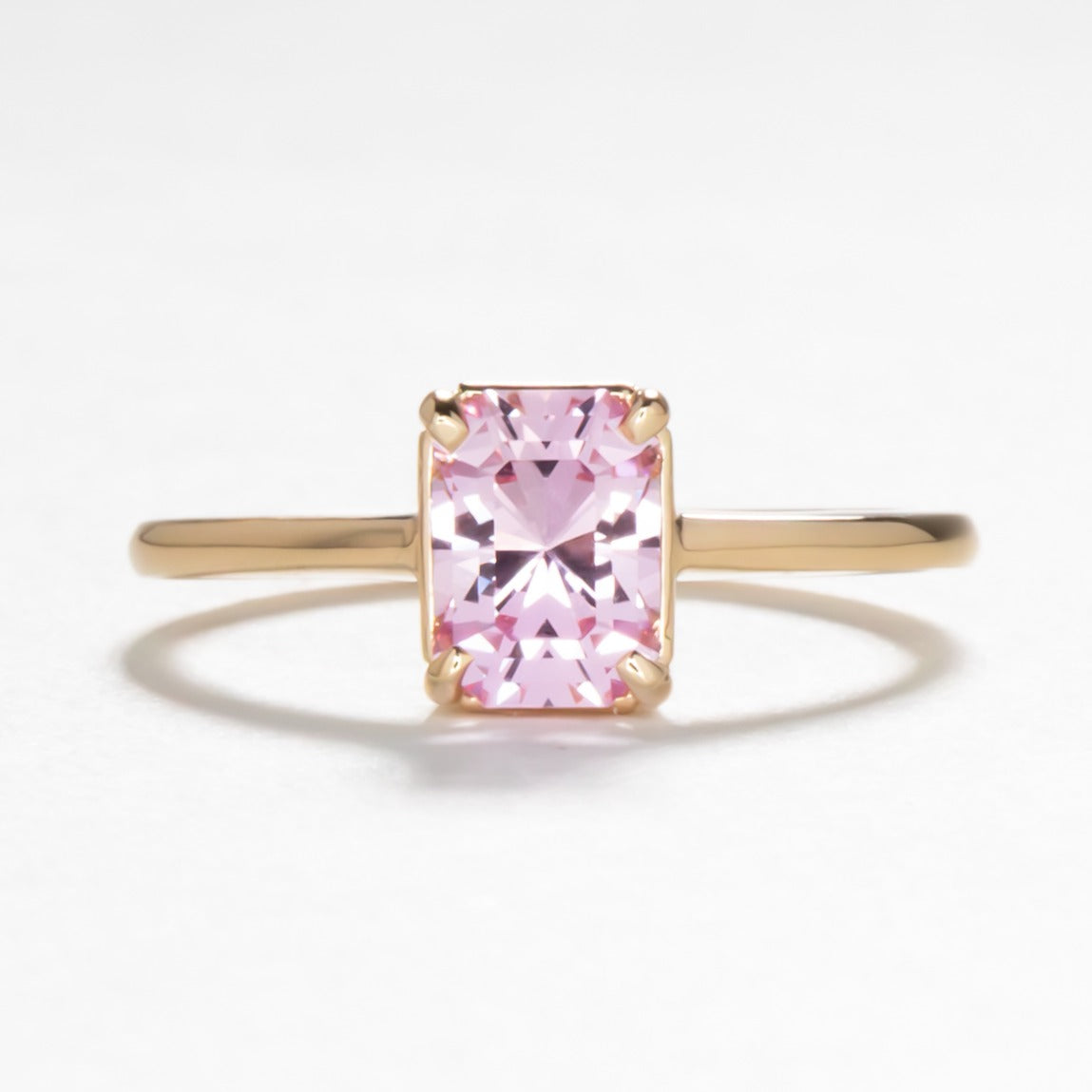 Adrienne solitaire engagement ring with radiant lab sapphire