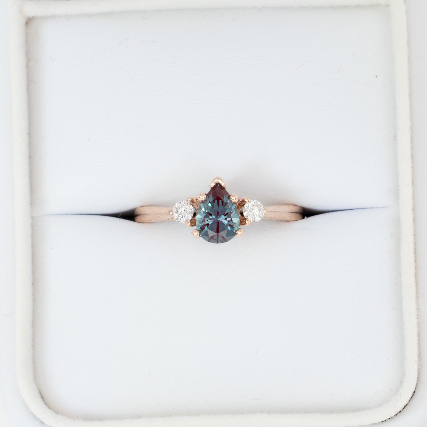 Carina three stone engagement ring with pear lab alexandrite