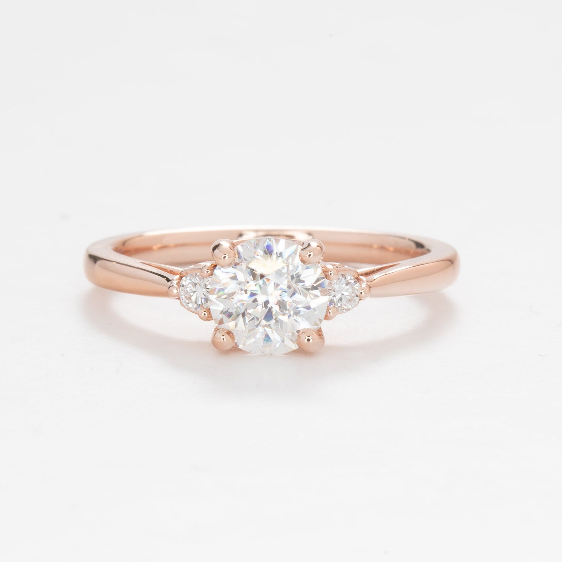 Carina three stone ring with white lab sapphire