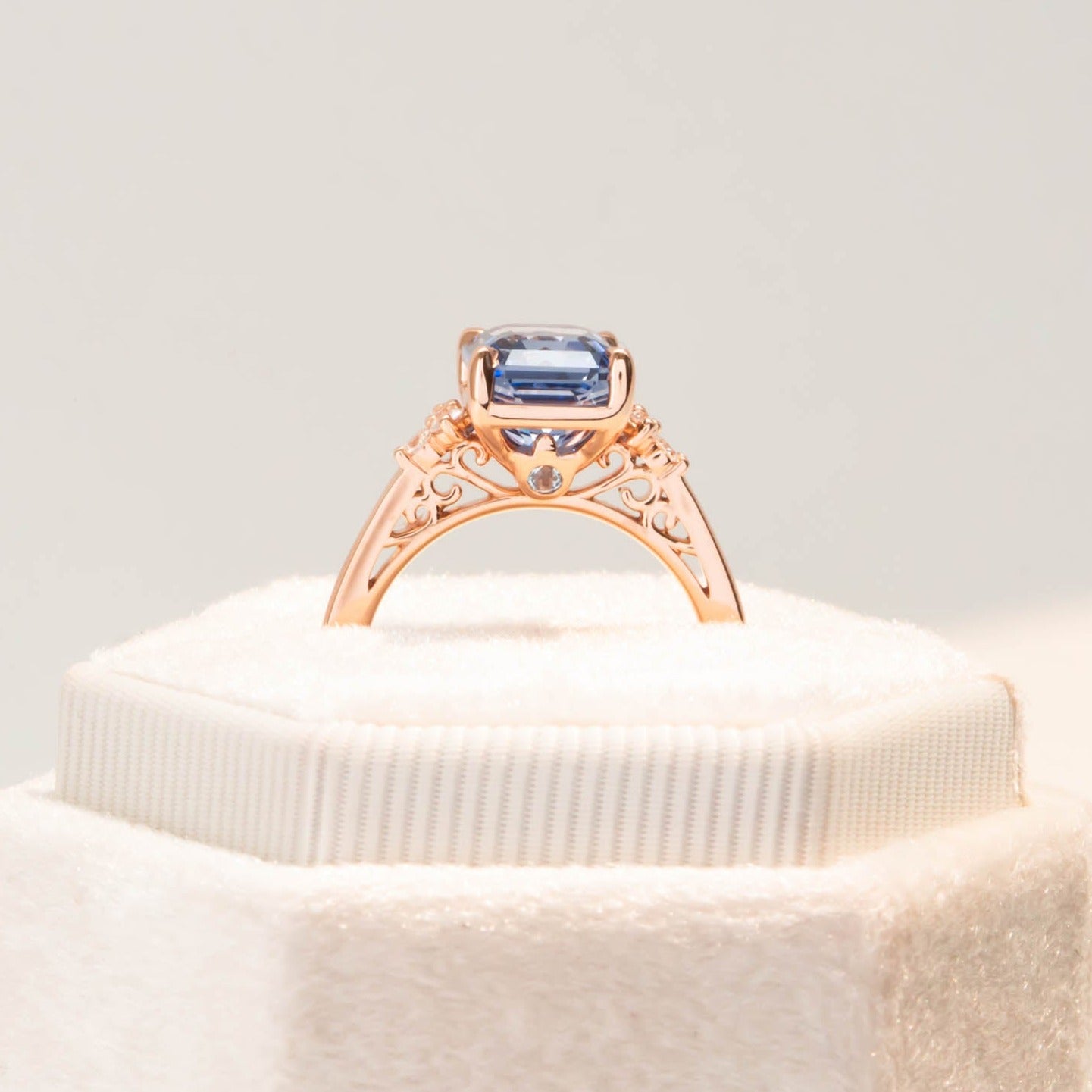 custom engagement ring with blue radiant lab sapphire