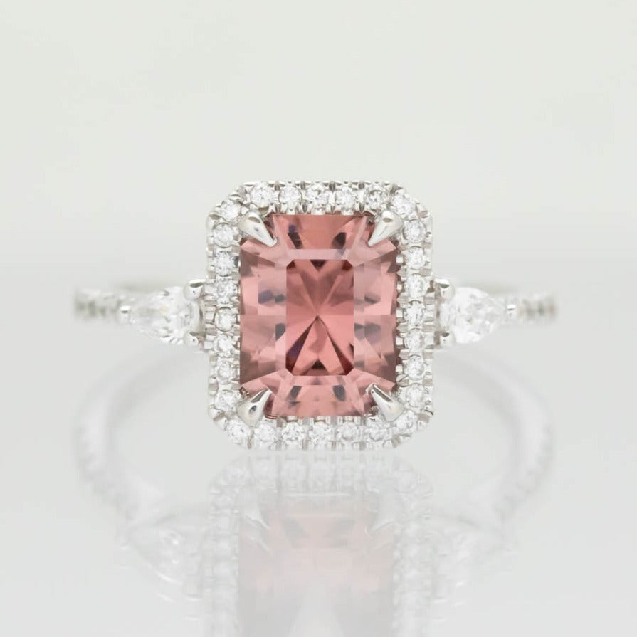 Dawn halo three stone engagement ring