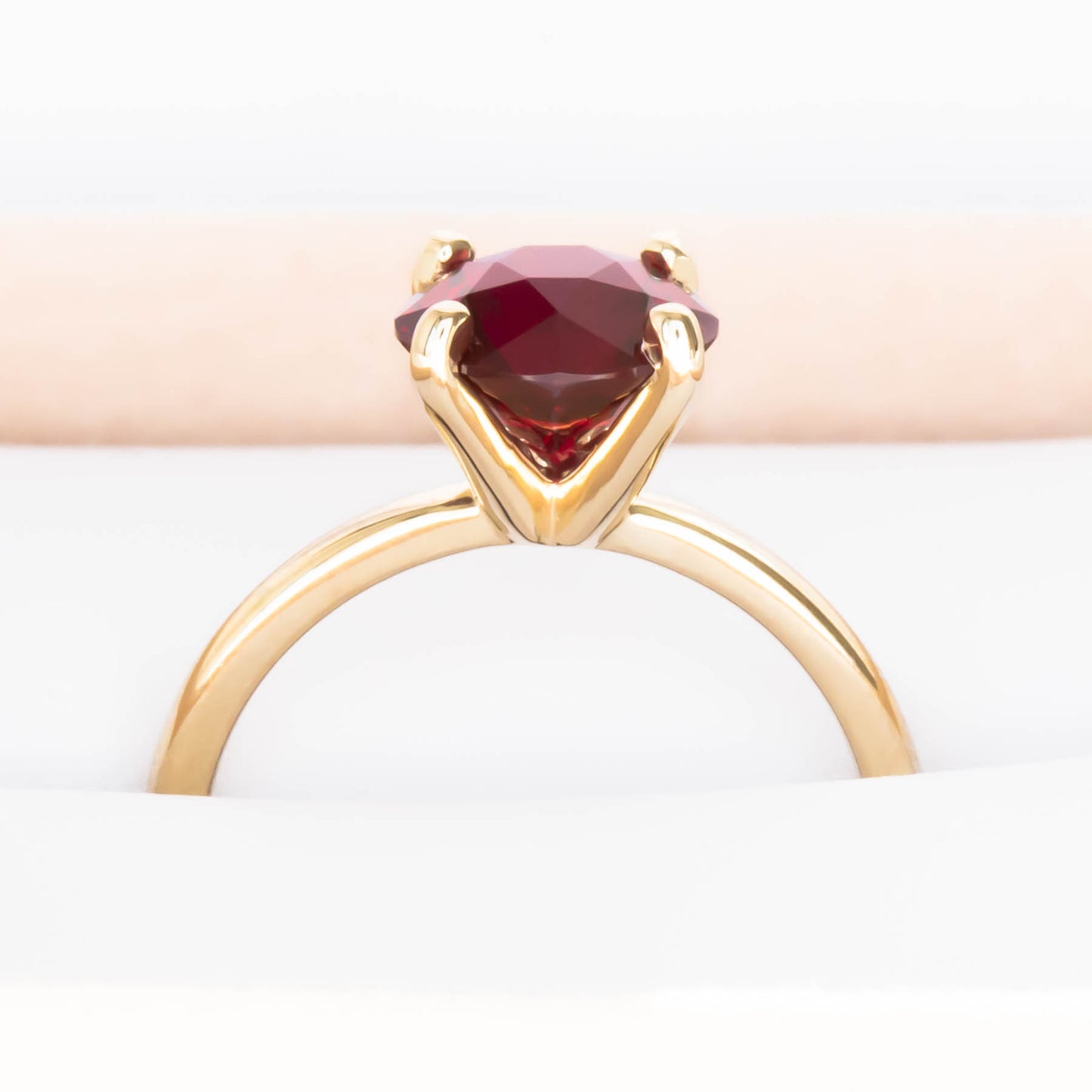 Evie solitaire engagement ring with lab ruby