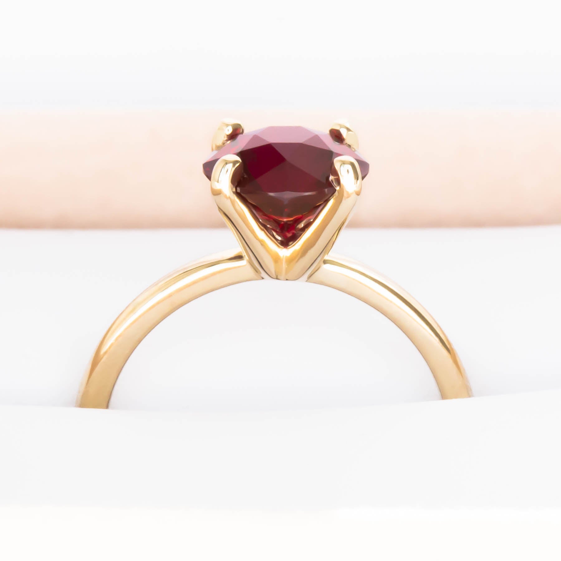 Evie solitaire engagement ring with lab ruby