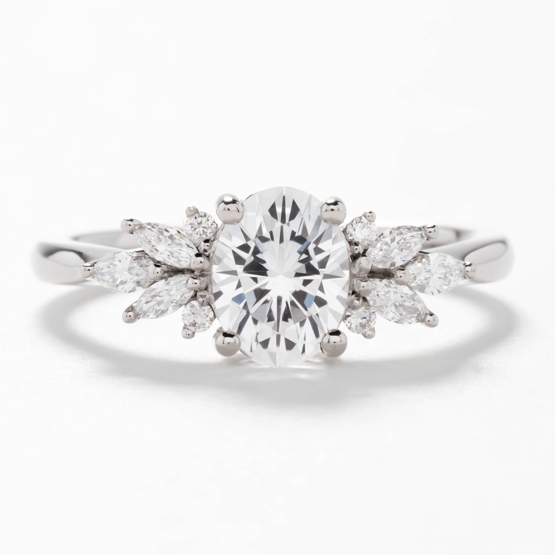 Kinda oval lab diamond engagement ring