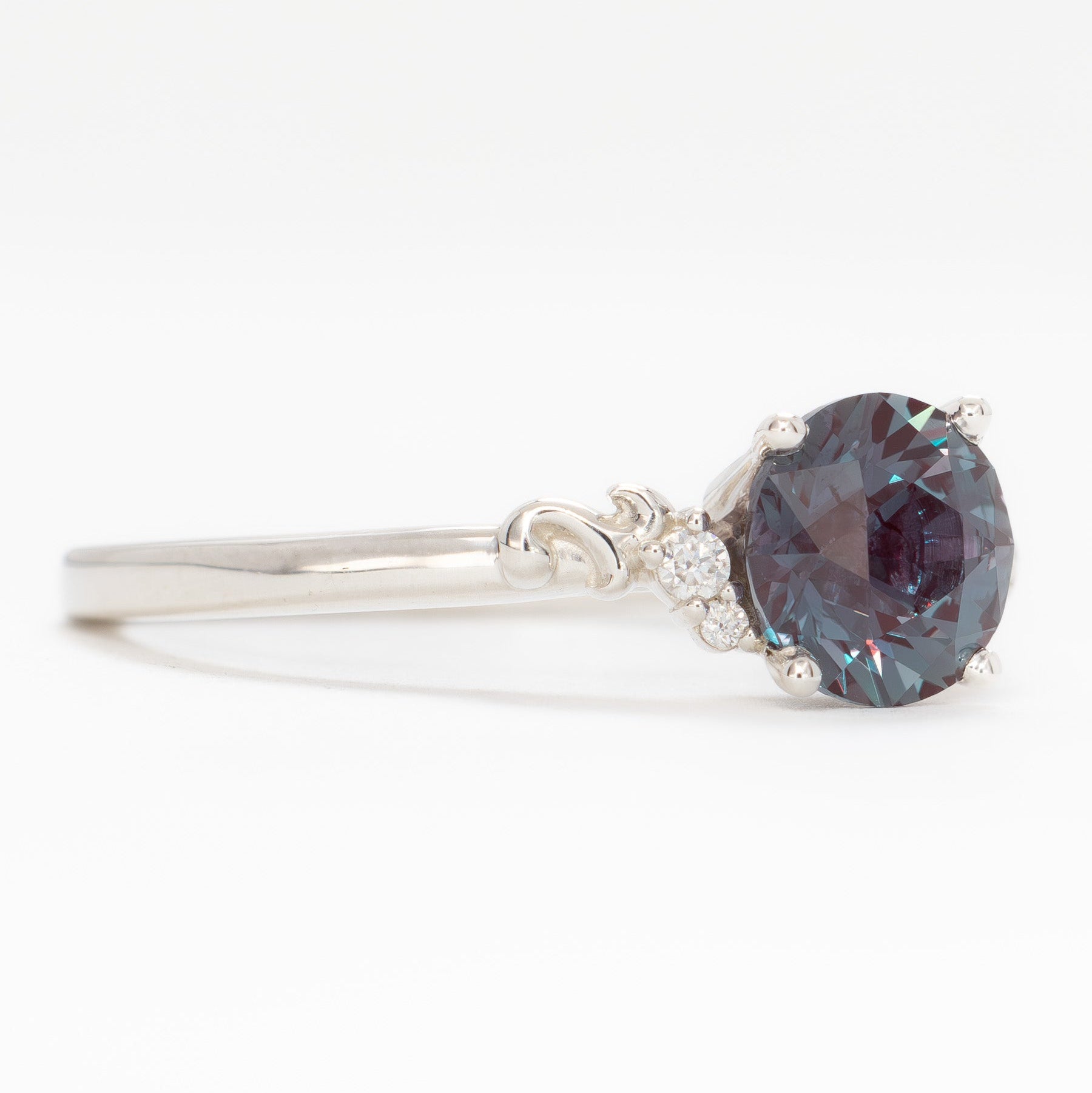 Nellie nature inspired engagement ring with round lab alexandrite