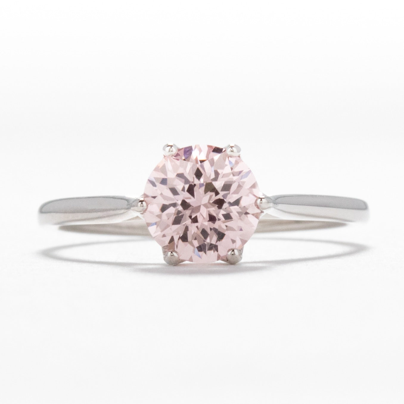 daphnis solitaire engagement ring with lab sapphire