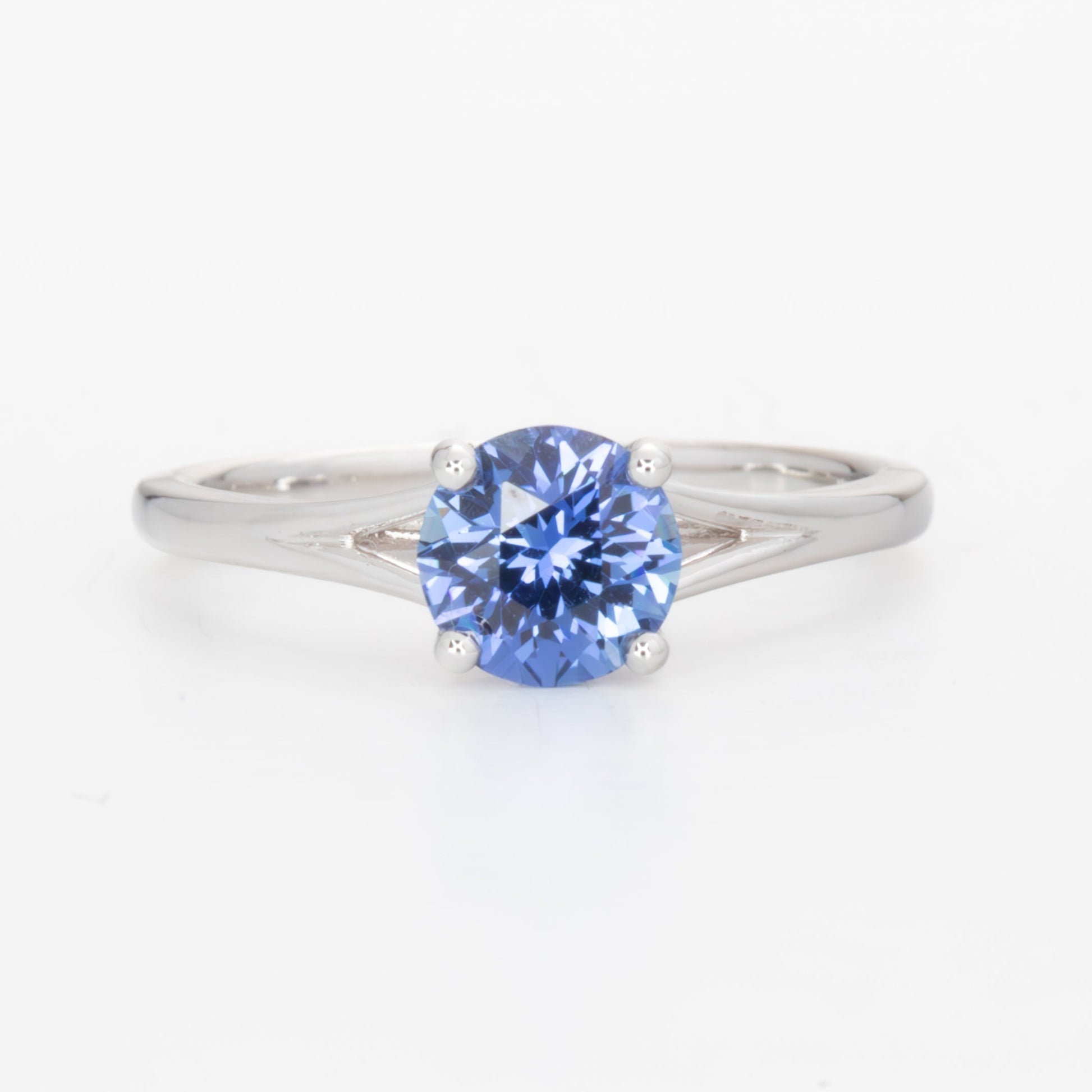 Neve split shank solitaire ring with blue lab sapphire