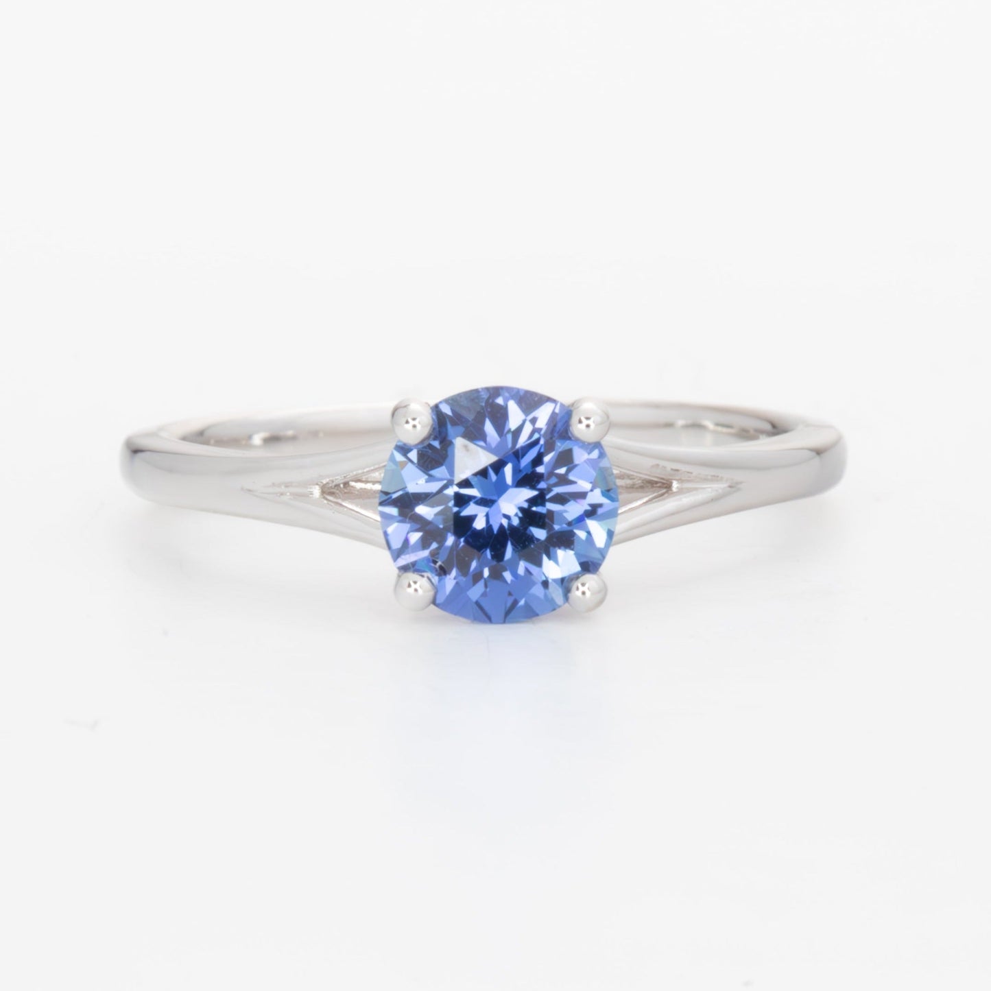 Neve split shank solitaire ring with blue lab sapphire