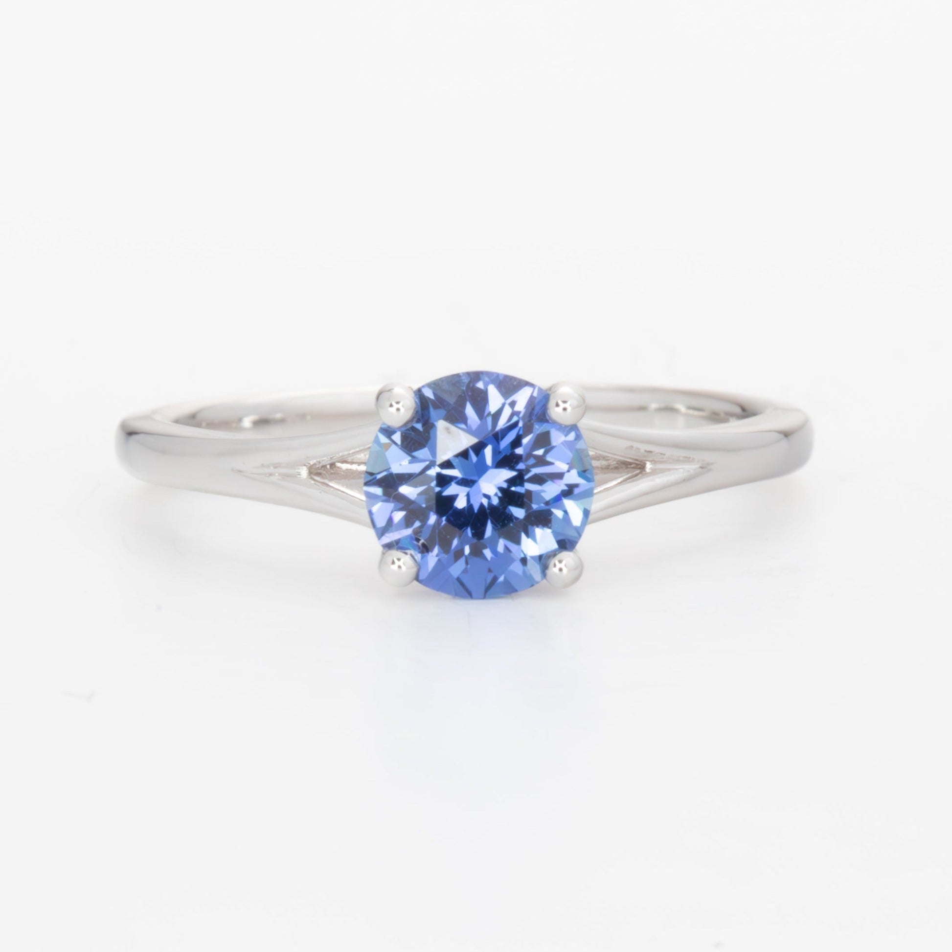 Neve split shank solitaire ring with blue lab sapphire