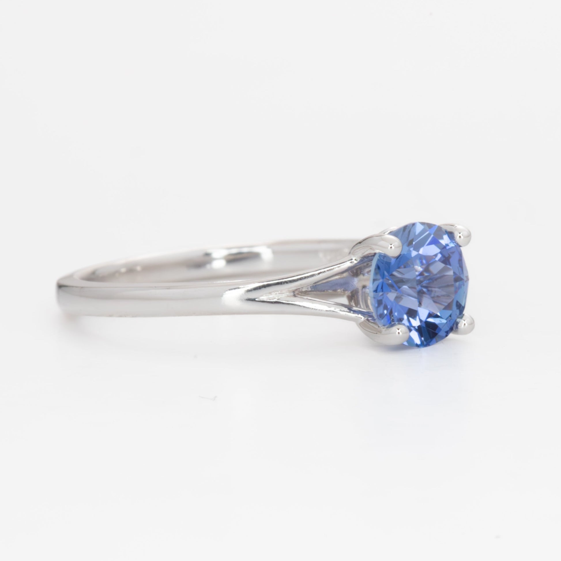 Neve split shank solitaire ring with blue lab sapphire