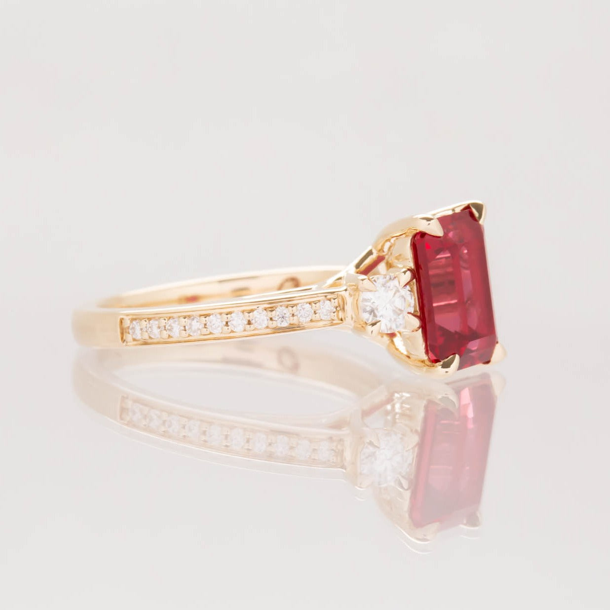 Oriane engagement ring with step cut lab ruby