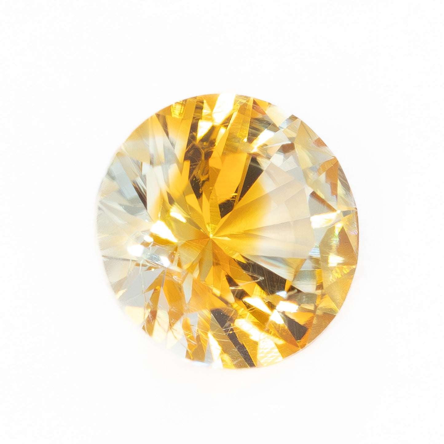 PSH0506 0.95ct parti color yellow and orange round brilliant montana sapphire
