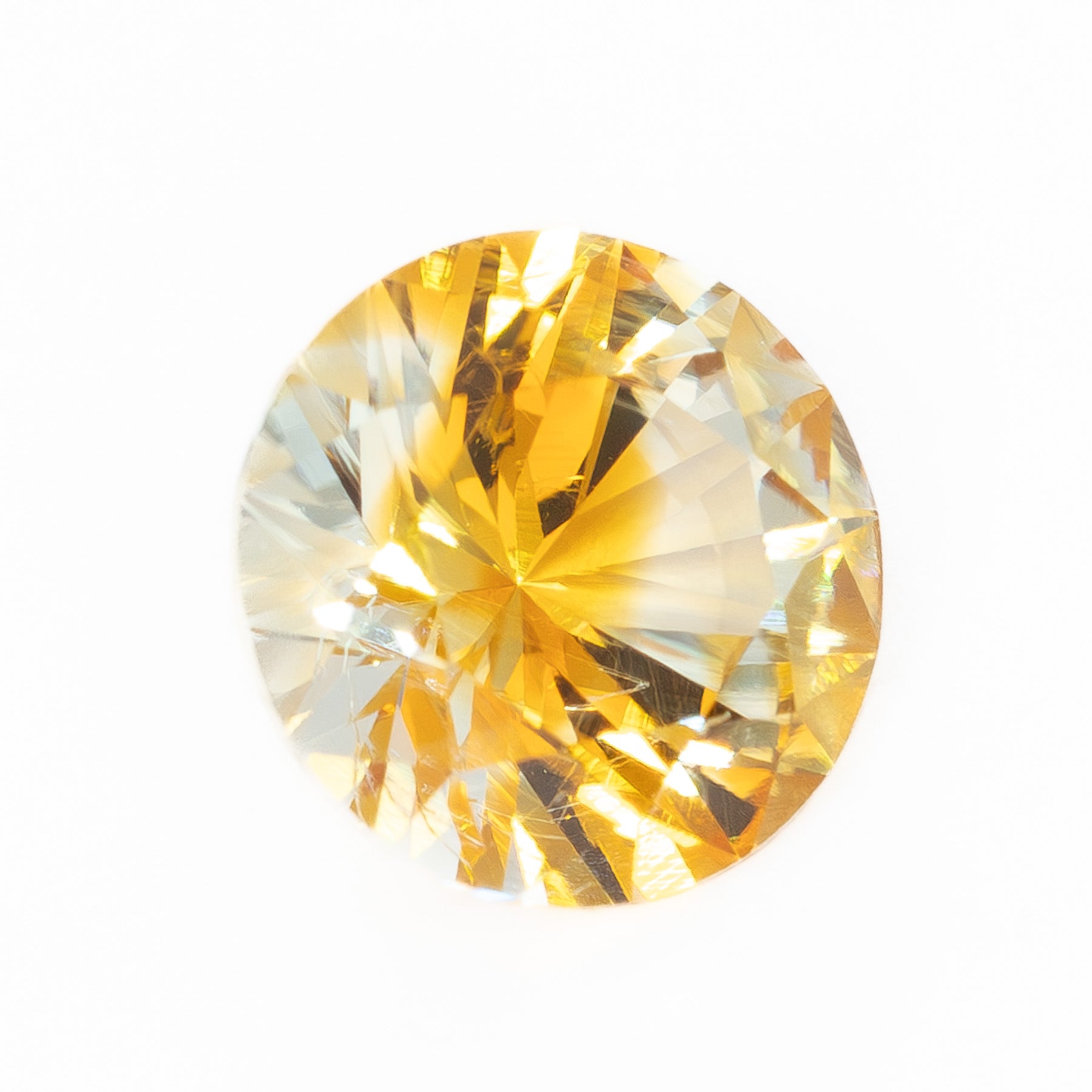 PSH0506 0.95ct parti color yellow and orange round brilliant montana sapphire