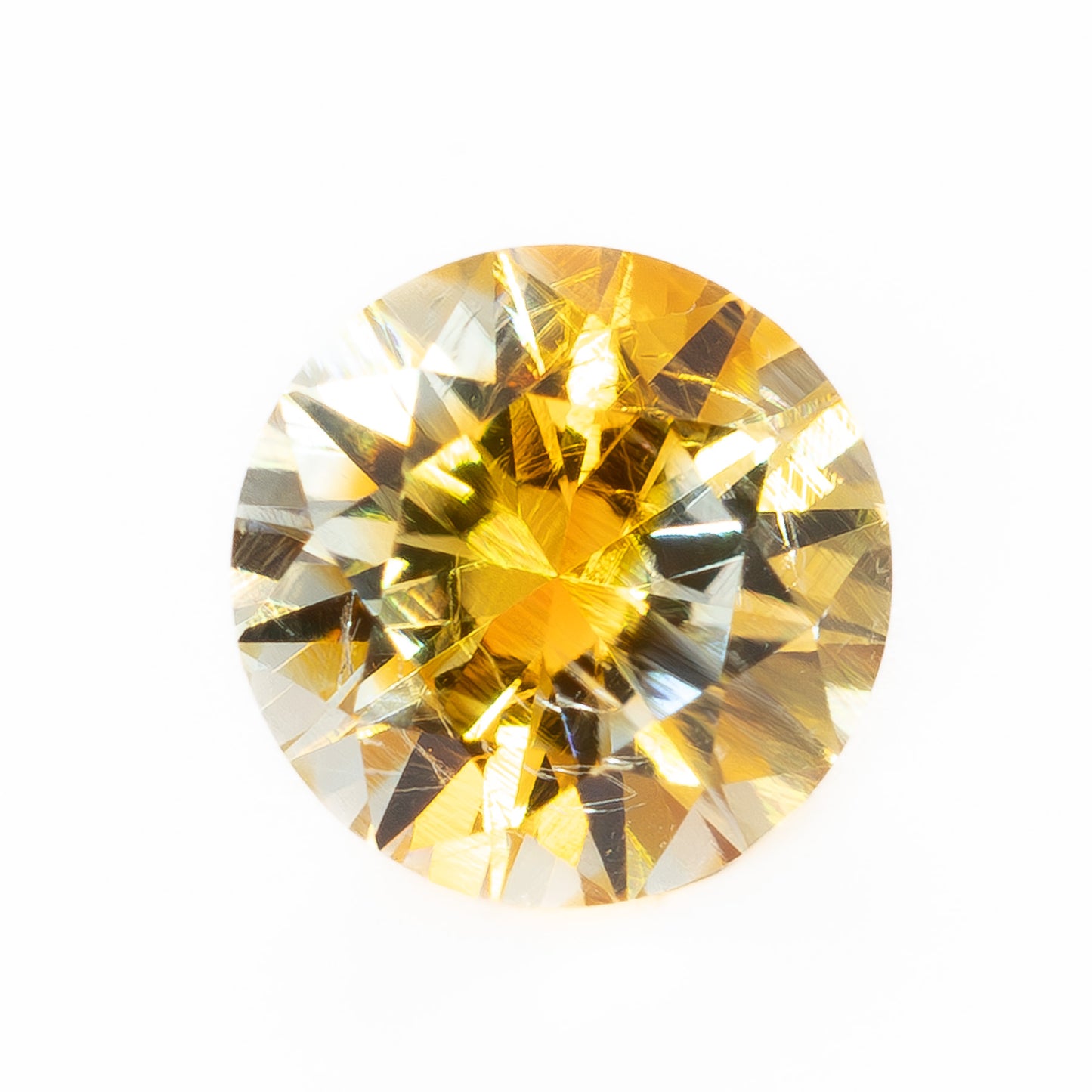 PSH0506 0.95ct parti color yellow and orange round brilliant montana sapphire