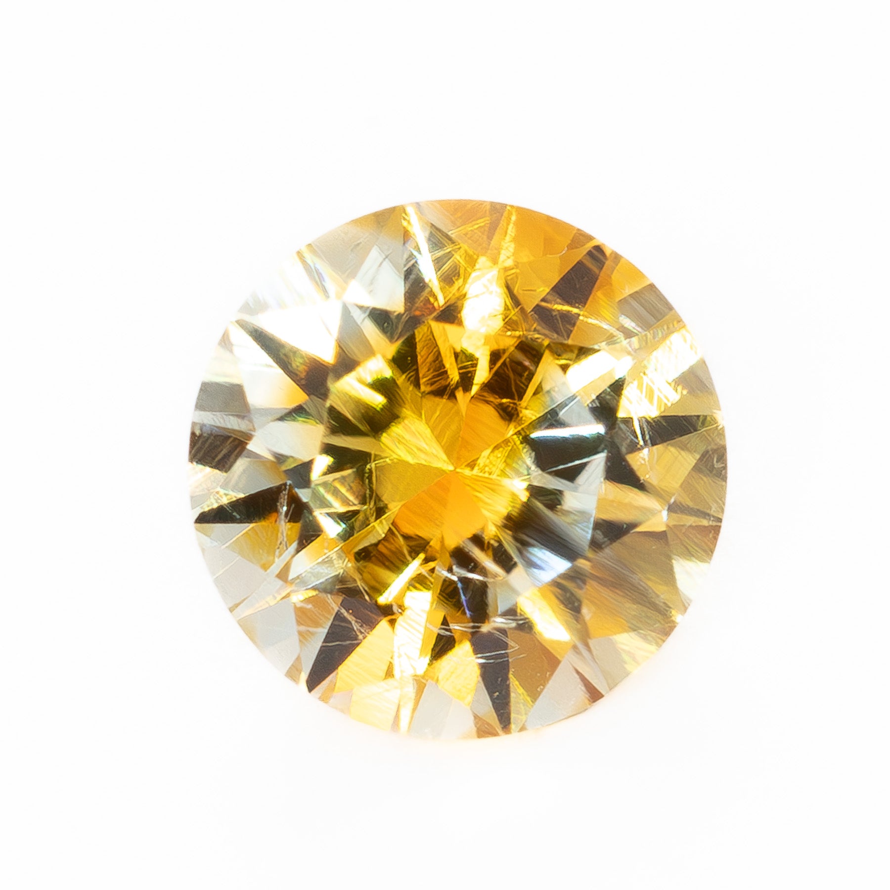 PSH0506 0.95ct parti color yellow and orange round brilliant montana sapphire