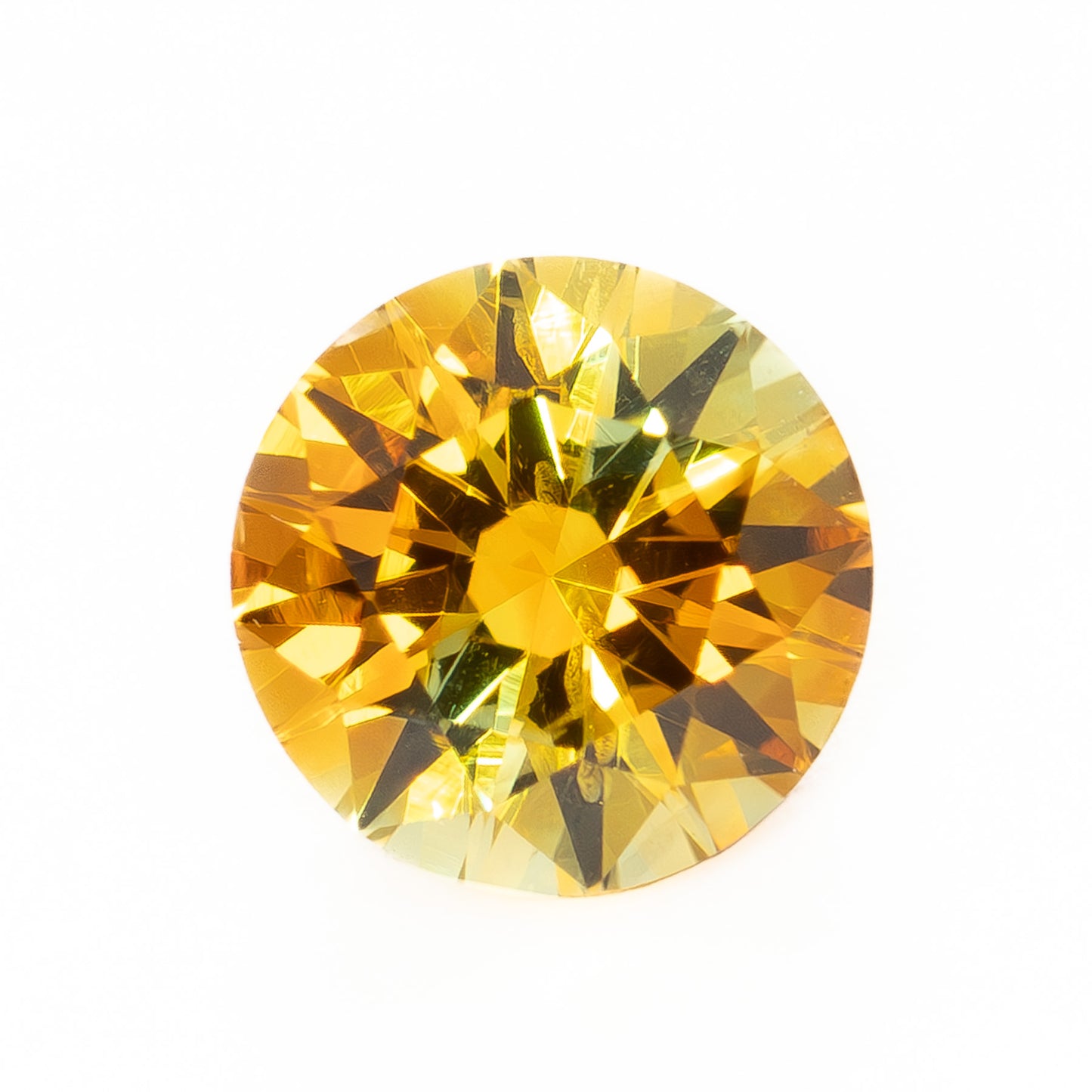 PSH0507 0.77ct parti color orange and yellow round brilliant montana sapphire