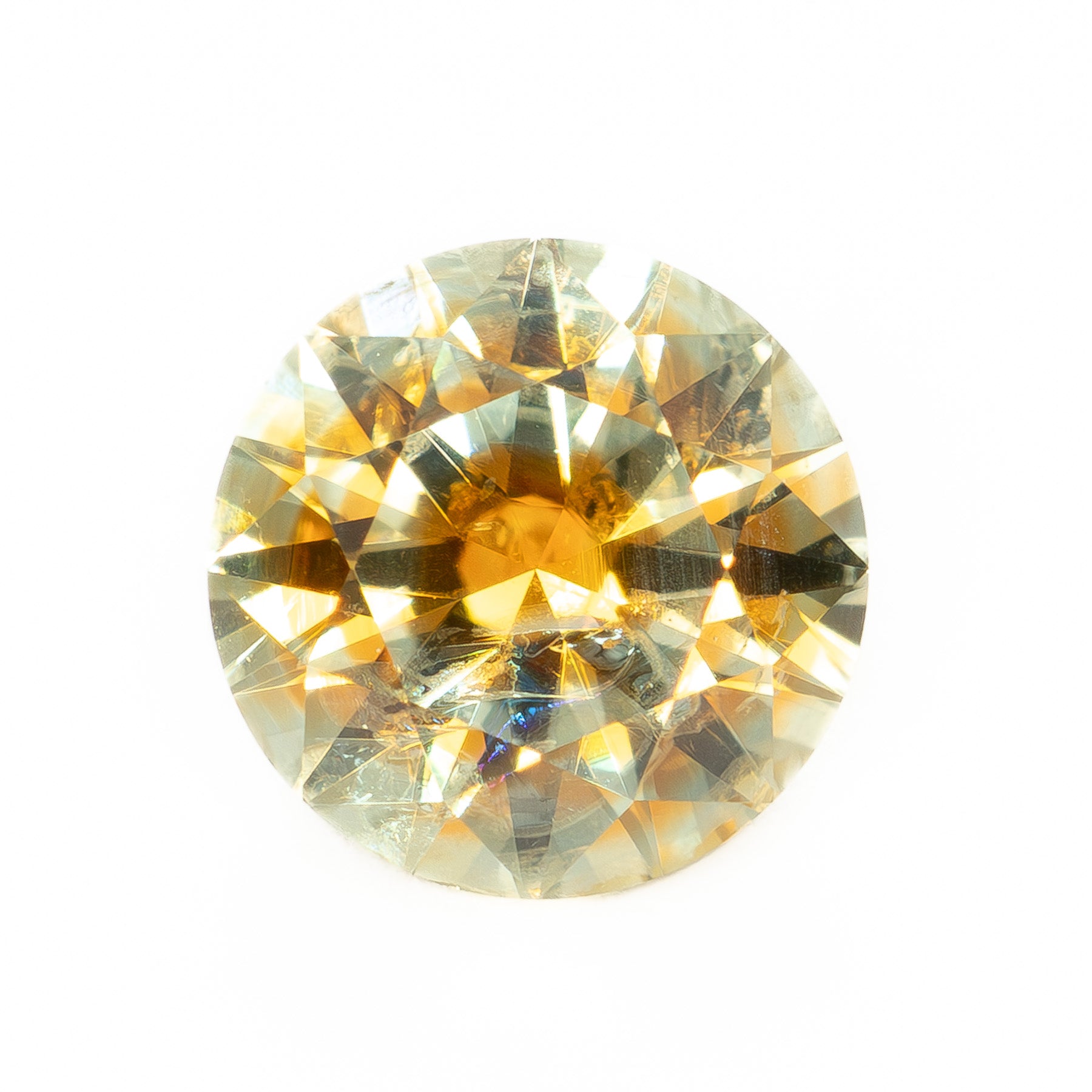PSH0524 1.16ct orange-yellow round brilliant montana sapphire