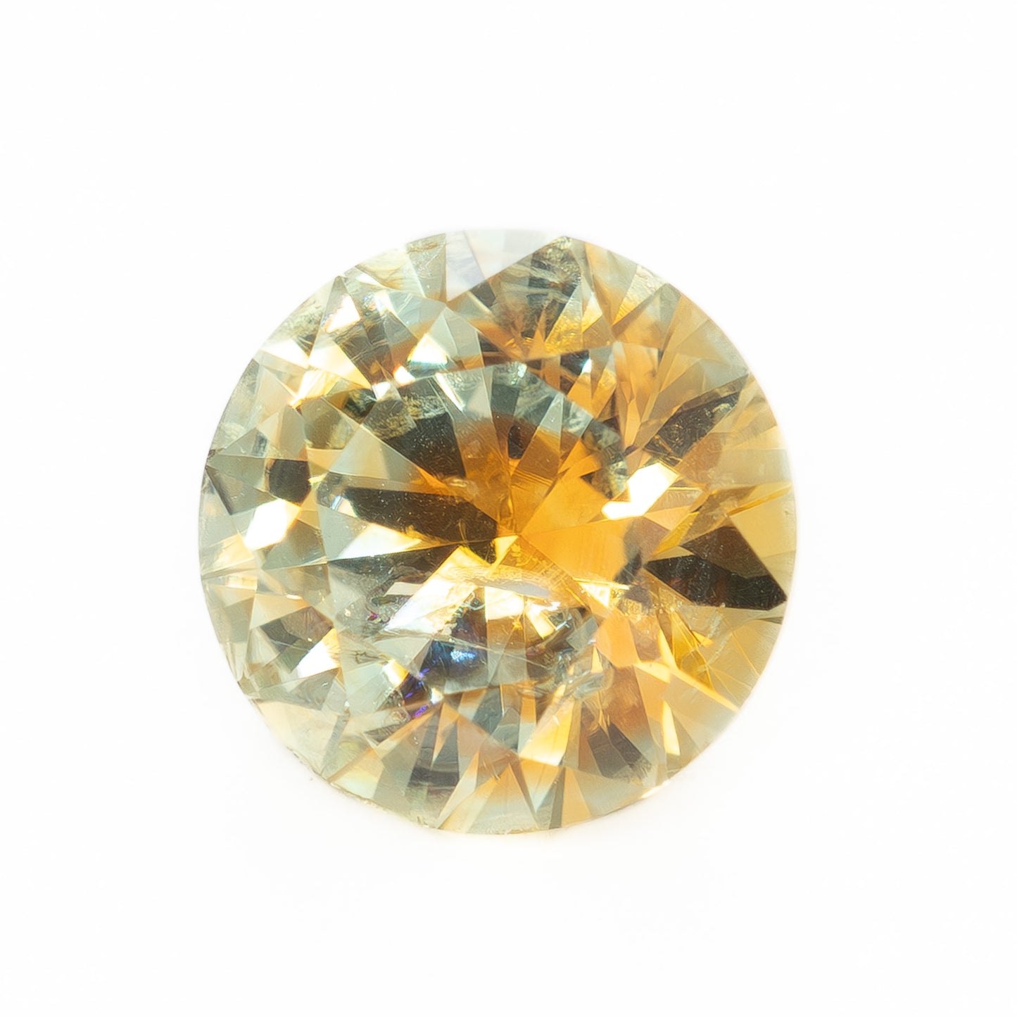 PSH0524 1.16ct orange-yellow round brilliant montana sapphire
