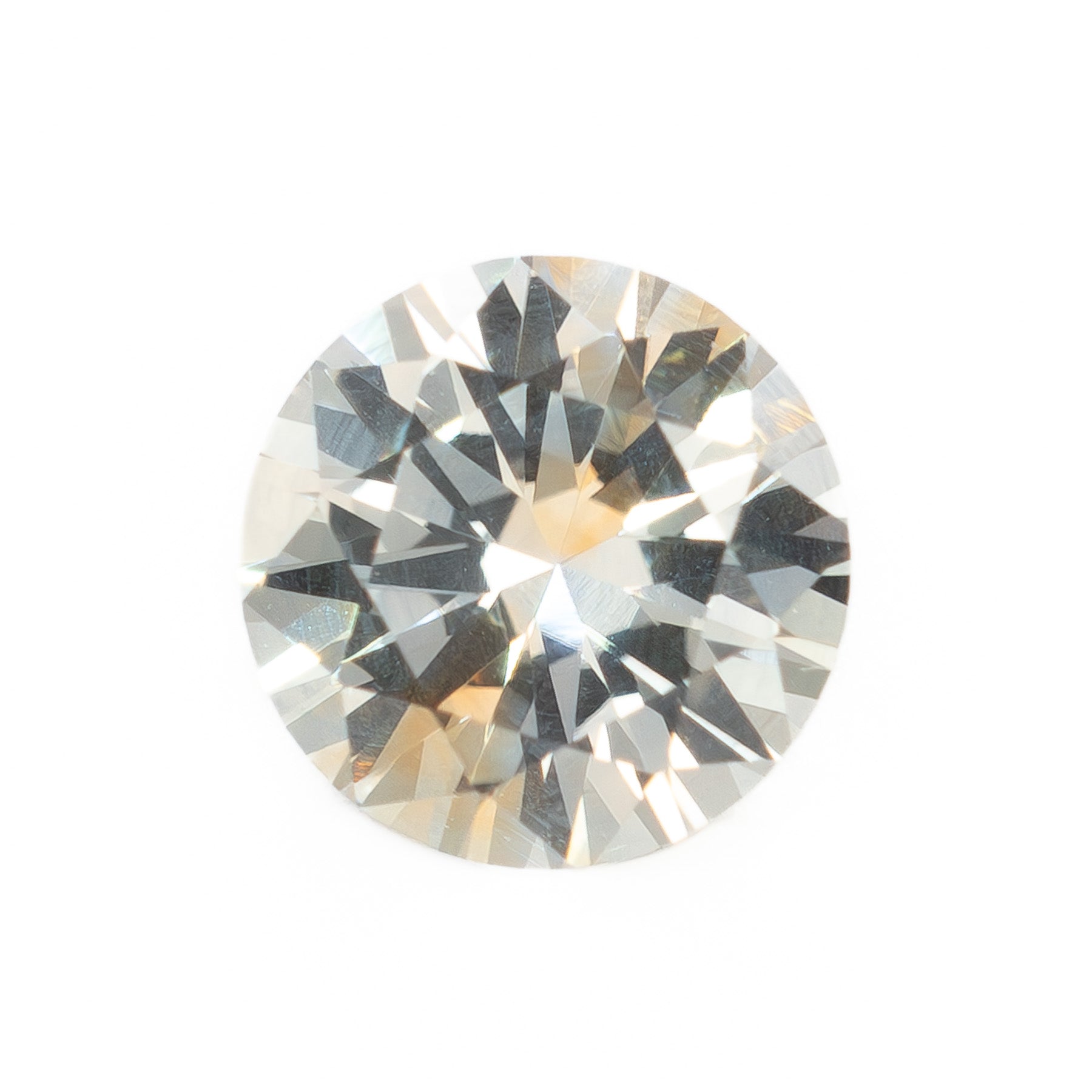 PSH0823 0.78ct yellow and white parti color round brilliant montana sapphire
