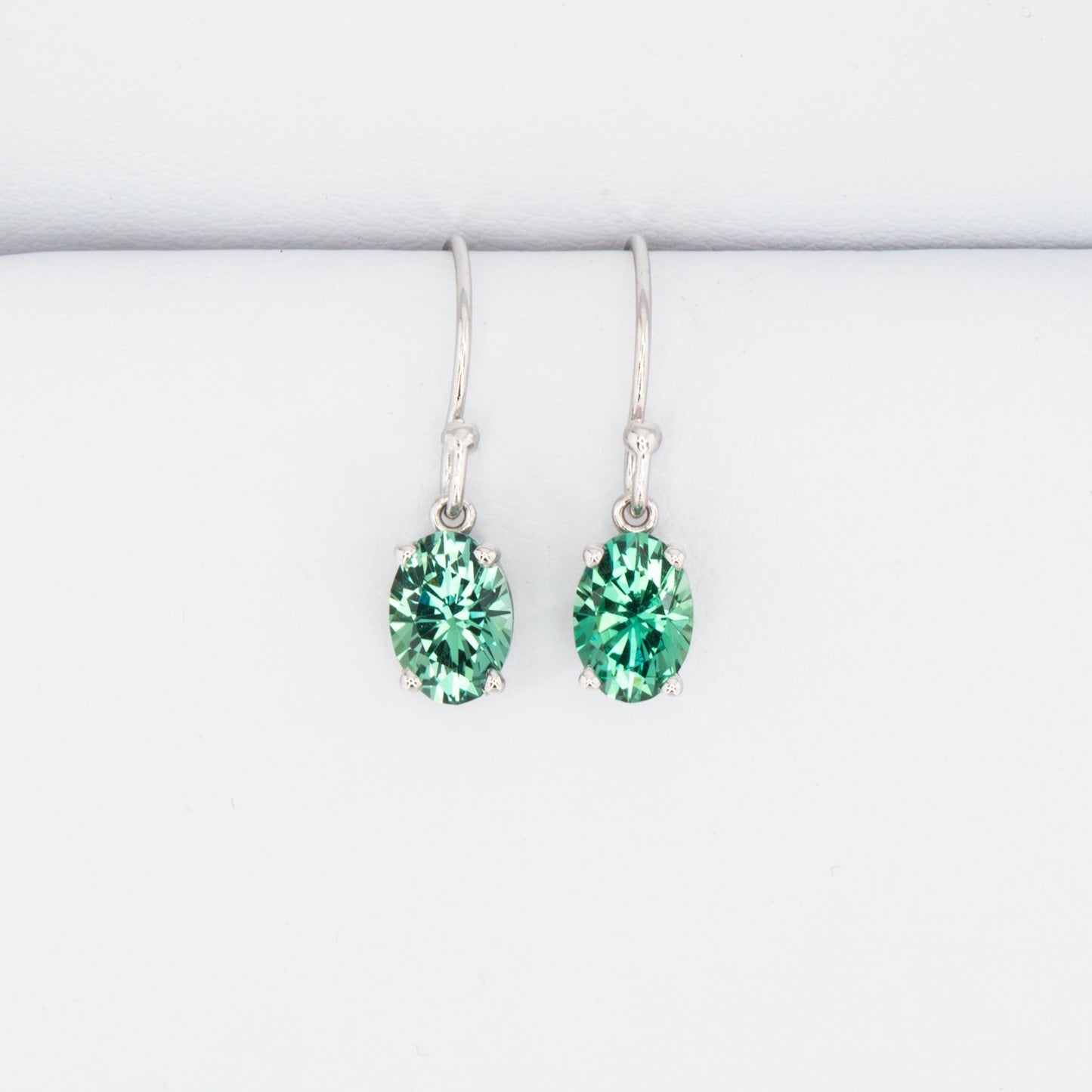 Paige drop earrings yellow gold and green lab sapphire ovals