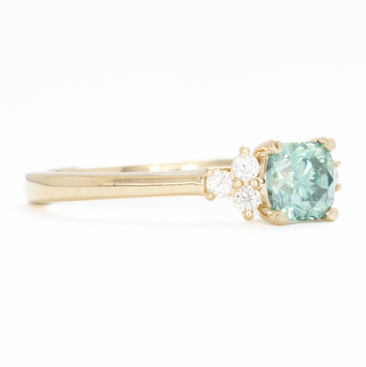 cynthia engagement ring with green moissanite cushion in yellow gold