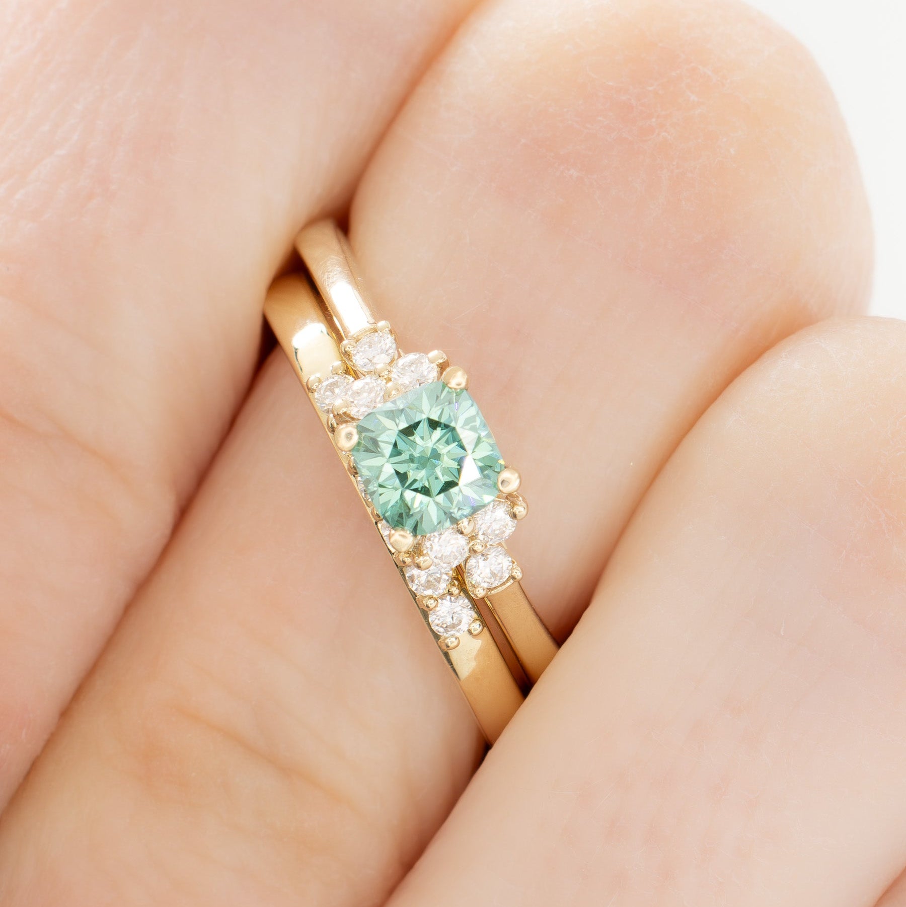 cynthia engagement ring with green moissanite cushion in yellow gold