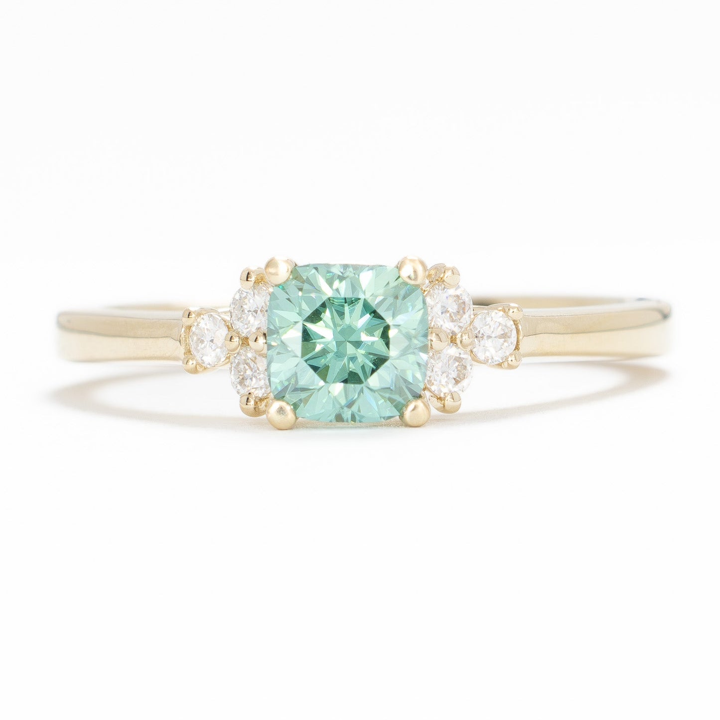 cynthia engagement ring with green moissanite cushion in yellow gold