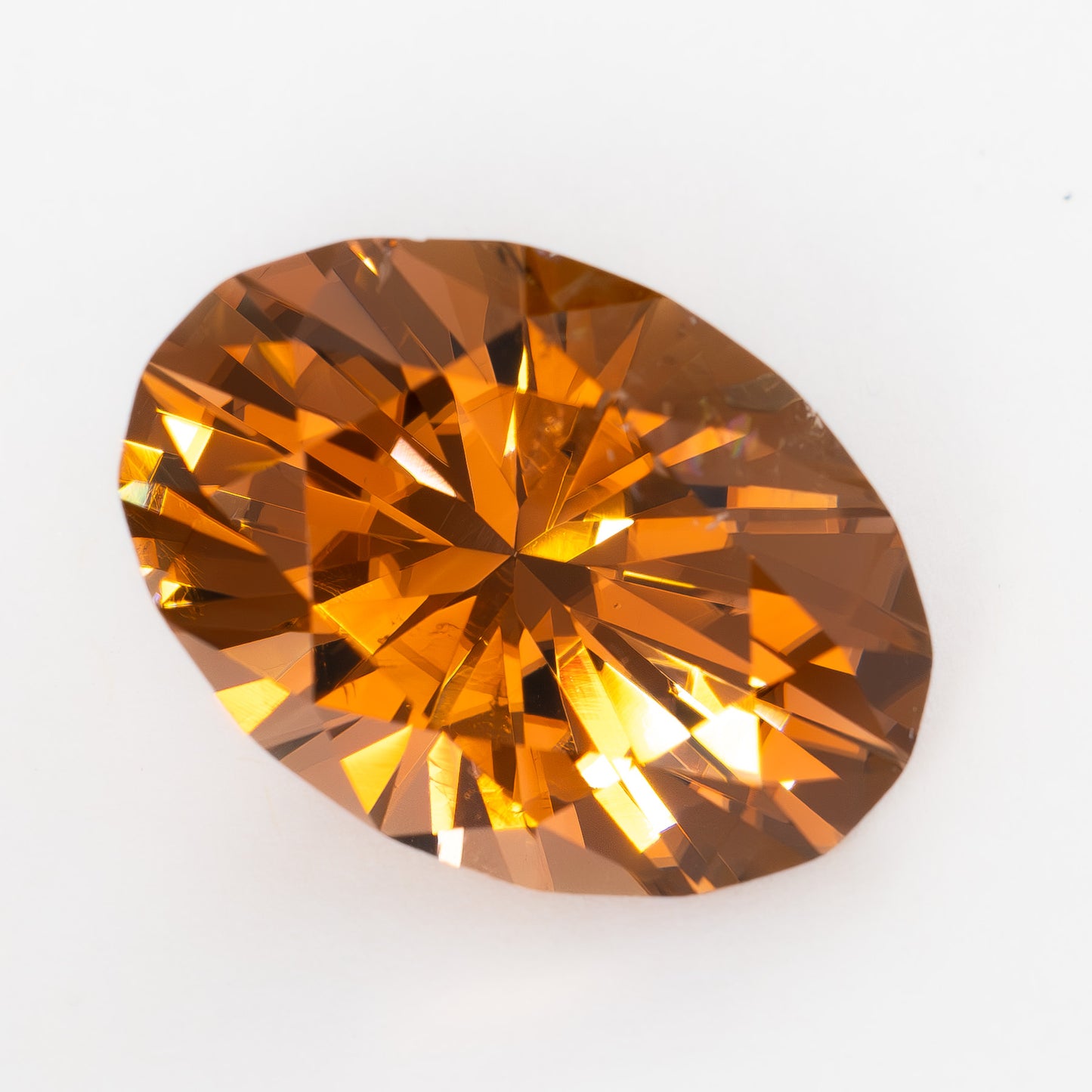 TL0109 13.91ct oval cut peach whiskey tourmaline