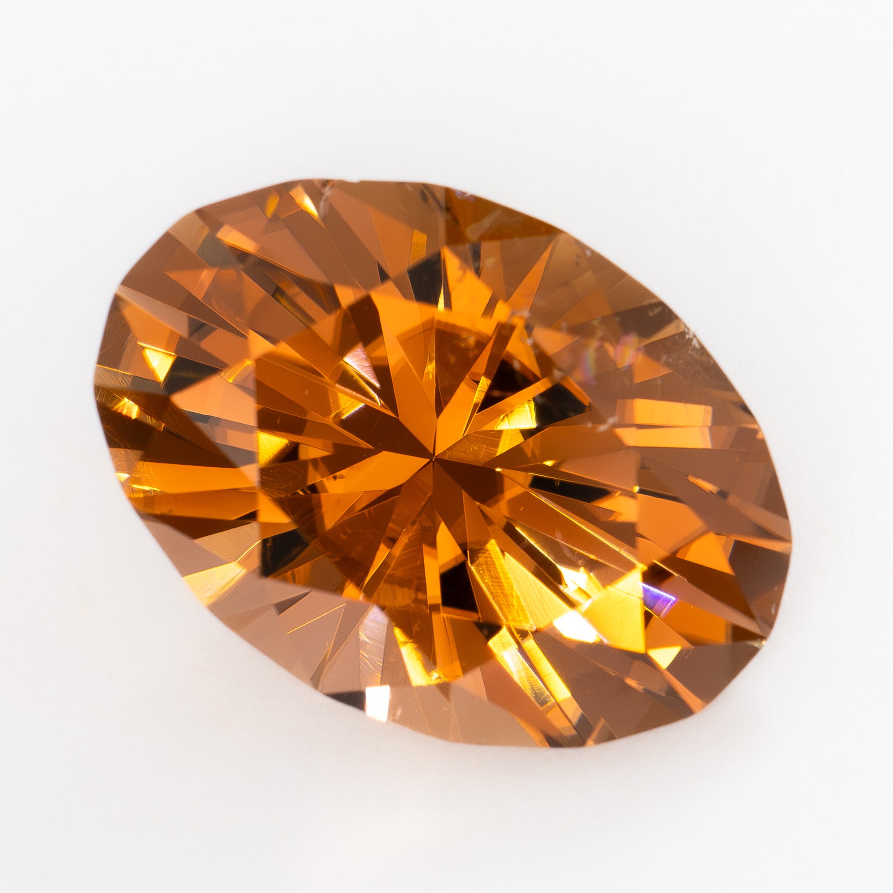 TL0109 13.91ct oval cut peach whiskey tourmaline