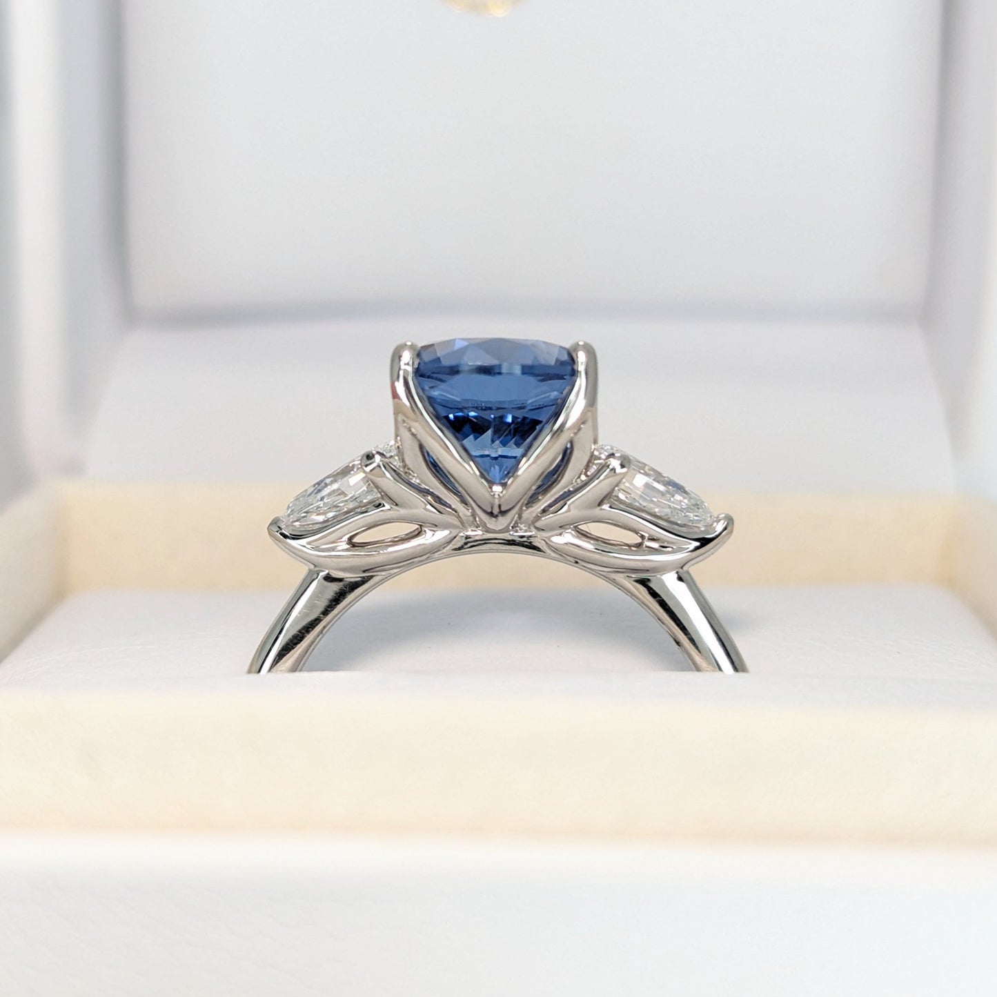 Tawnee three stone engagement ring with oval lab sapphire