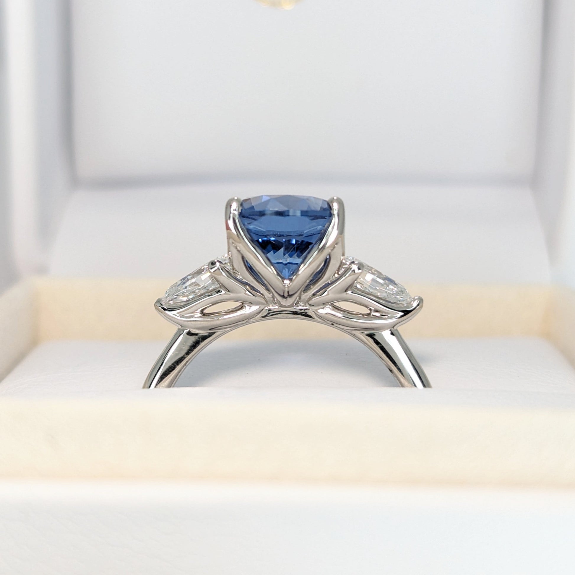 Tawnee three stone engagement ring with oval lab sapphire
