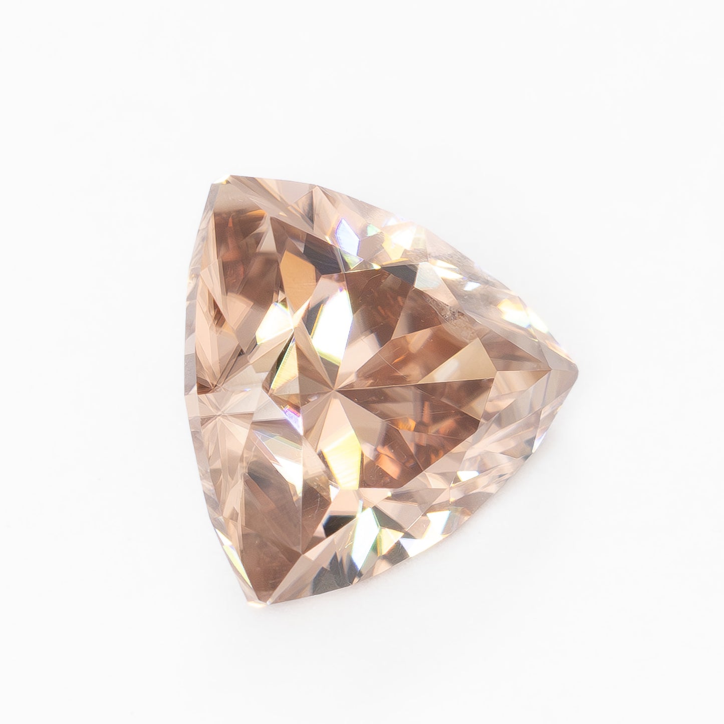 ZR0134 3.09ct champagne peach trillion cut zircon