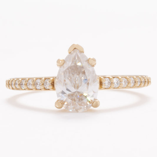 accented liv engagement ring with pear moissanite