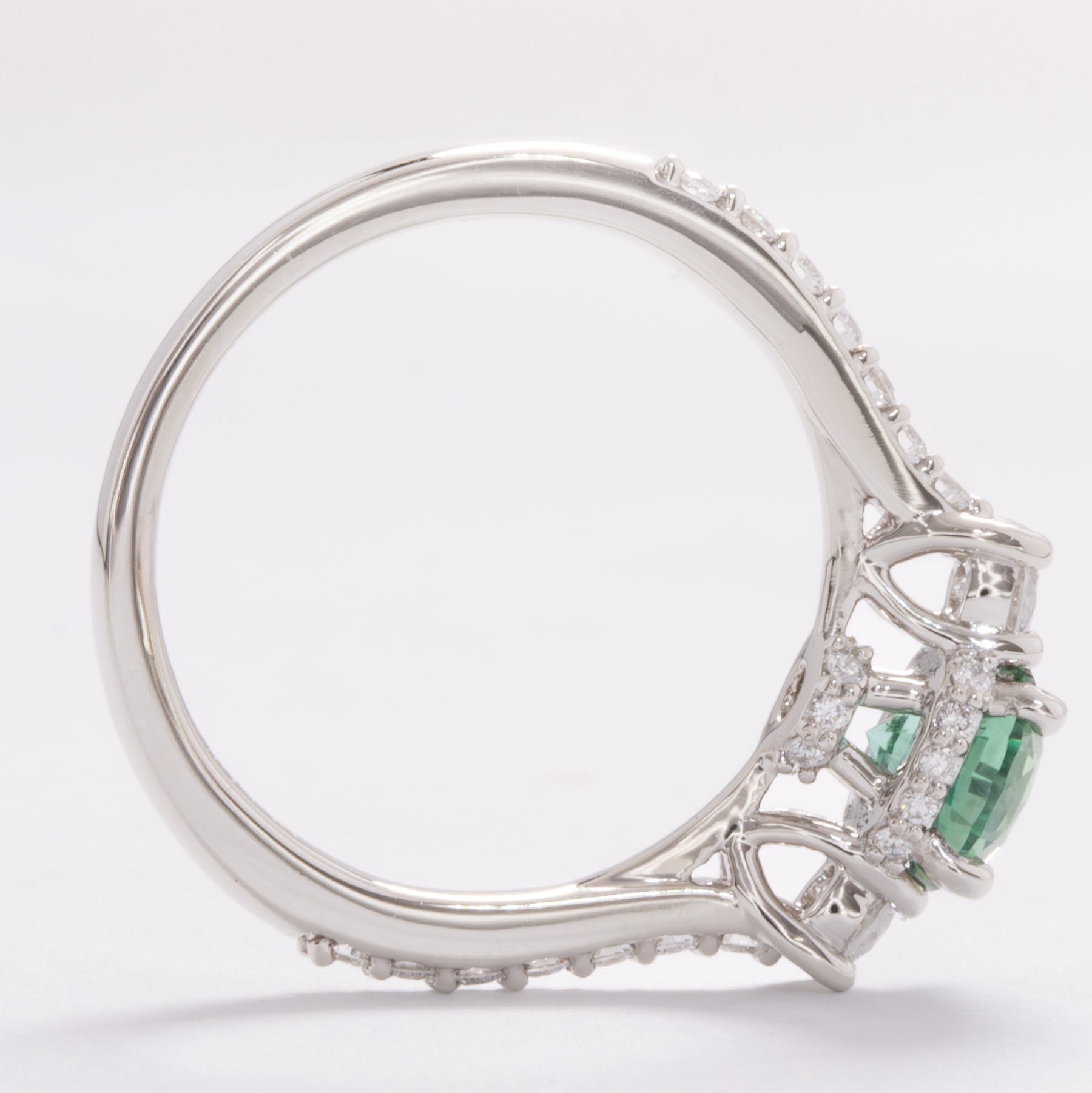 addison three stone engagement ring with green lab sapphire round